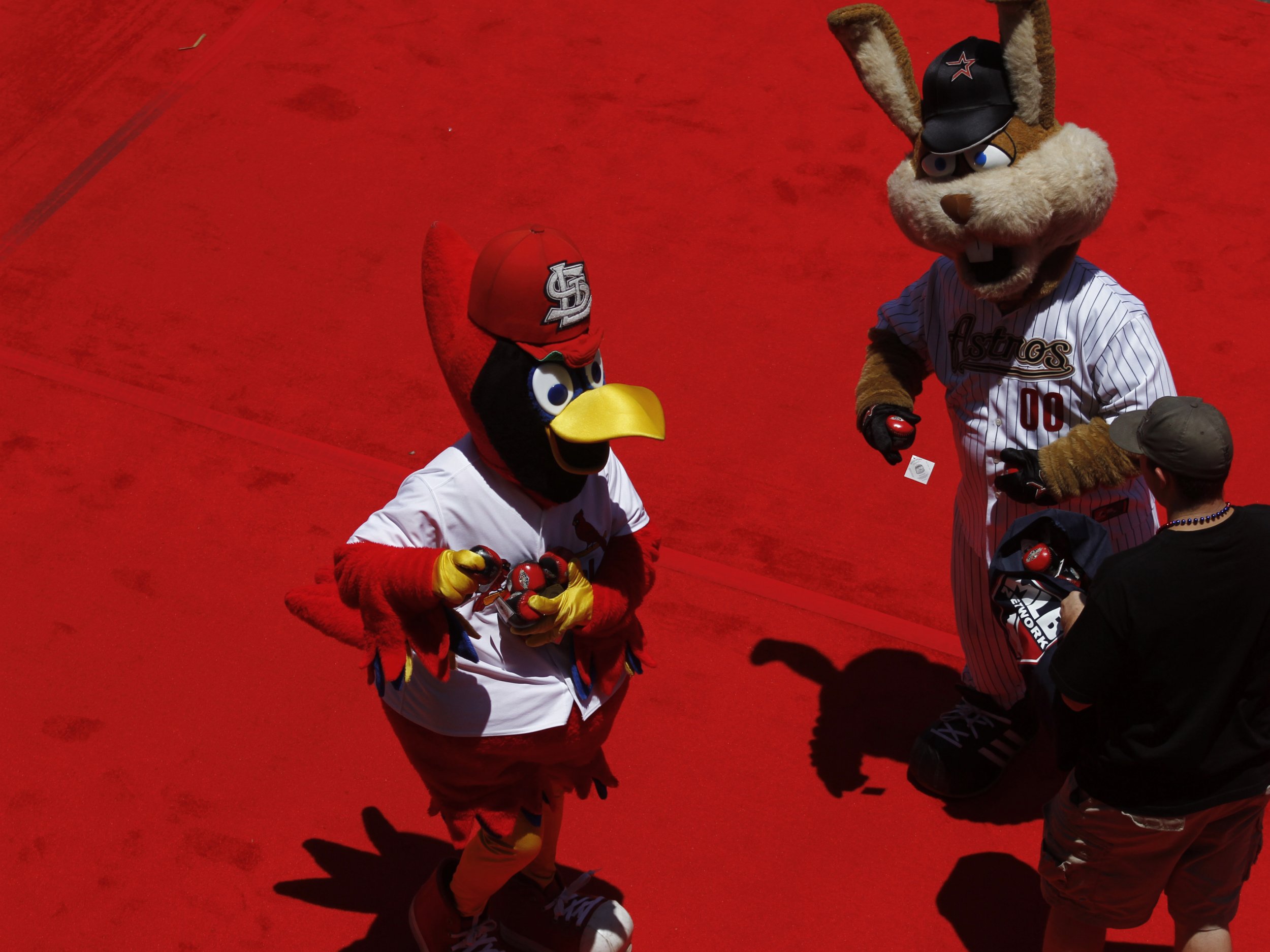 Houston Astros mascot Junction Jack sign an autograph for a fan. The  Houston Astros defeated the St. Louis Cardinals 4 - 1 at Minute Maid Park,  Houston, Texas. (Credit Image: © Luis