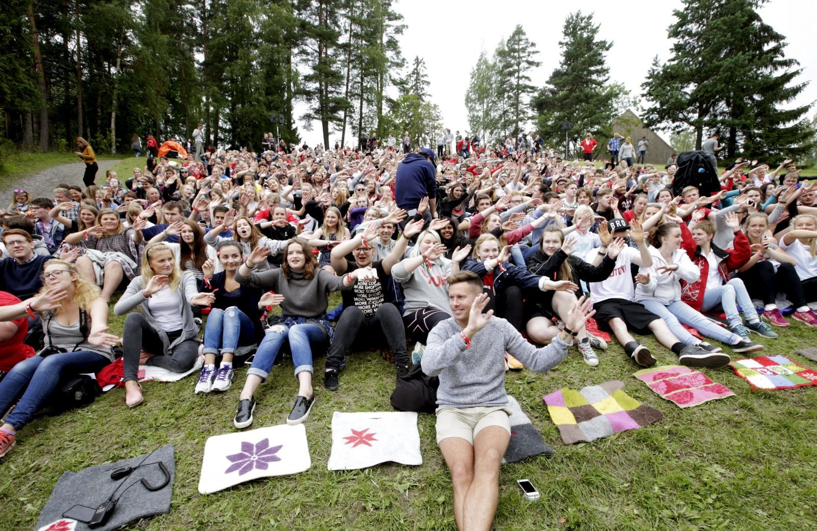 ...(AUF) and attack survivor Eskil Pedersen (front) and other youths attend...