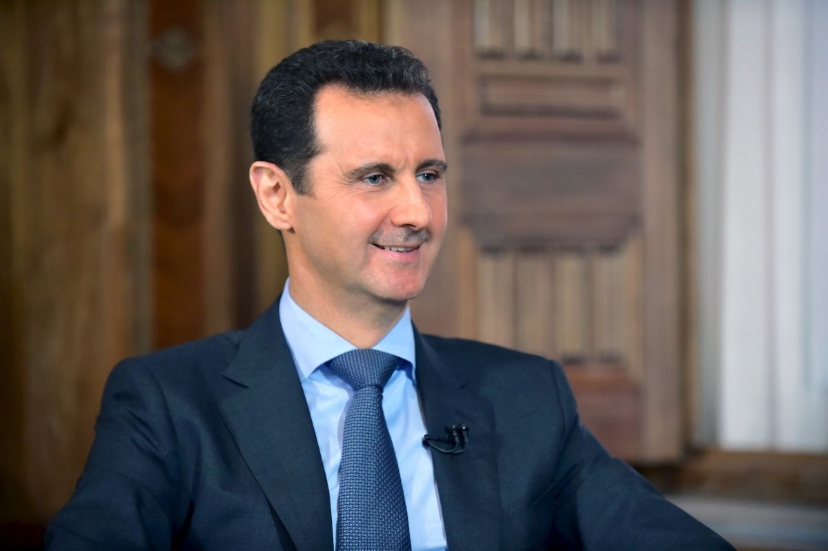 Putin: Assad ready to share power