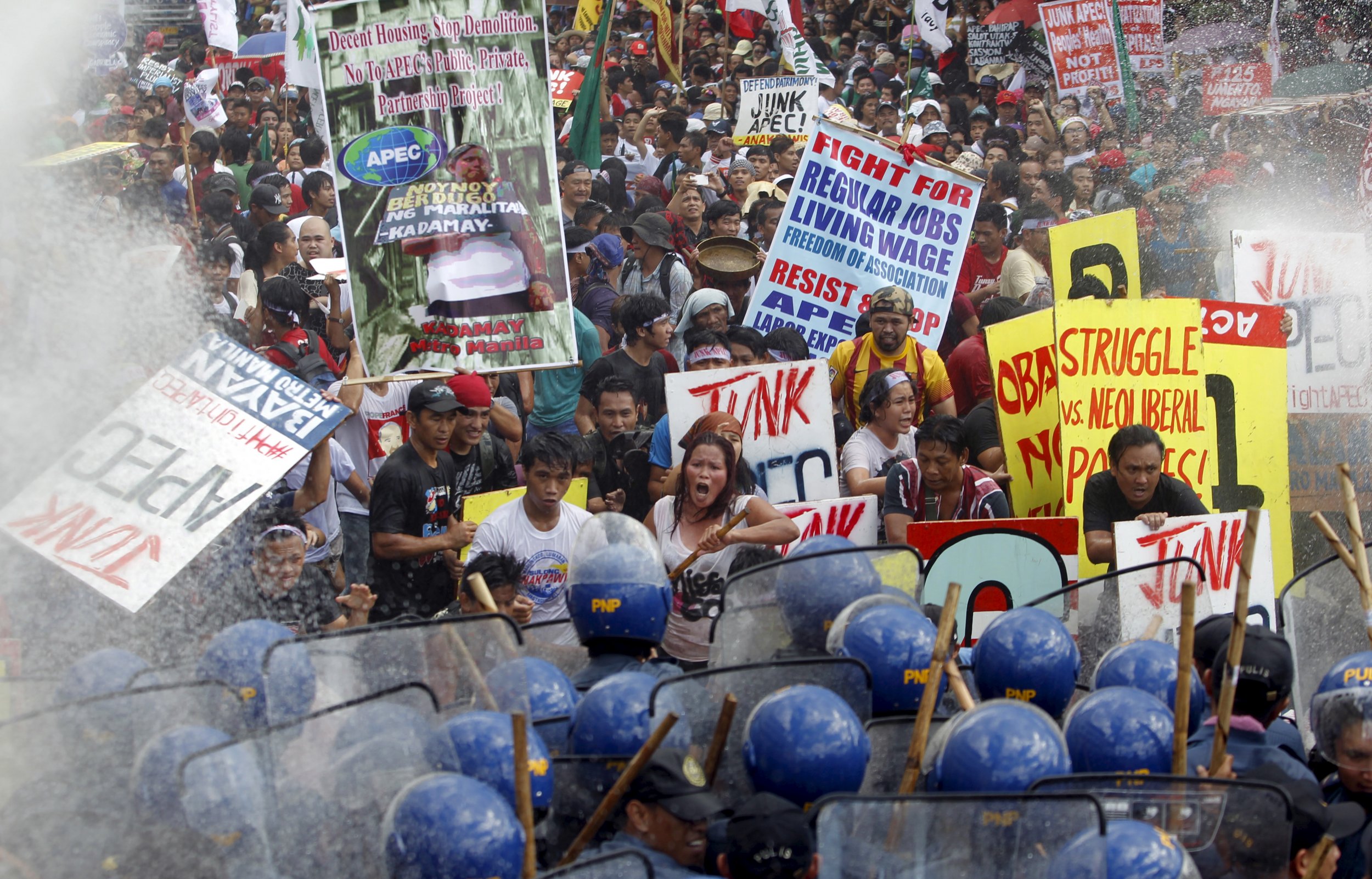 Police and Protesters Clash on Final Day of APEC Summit