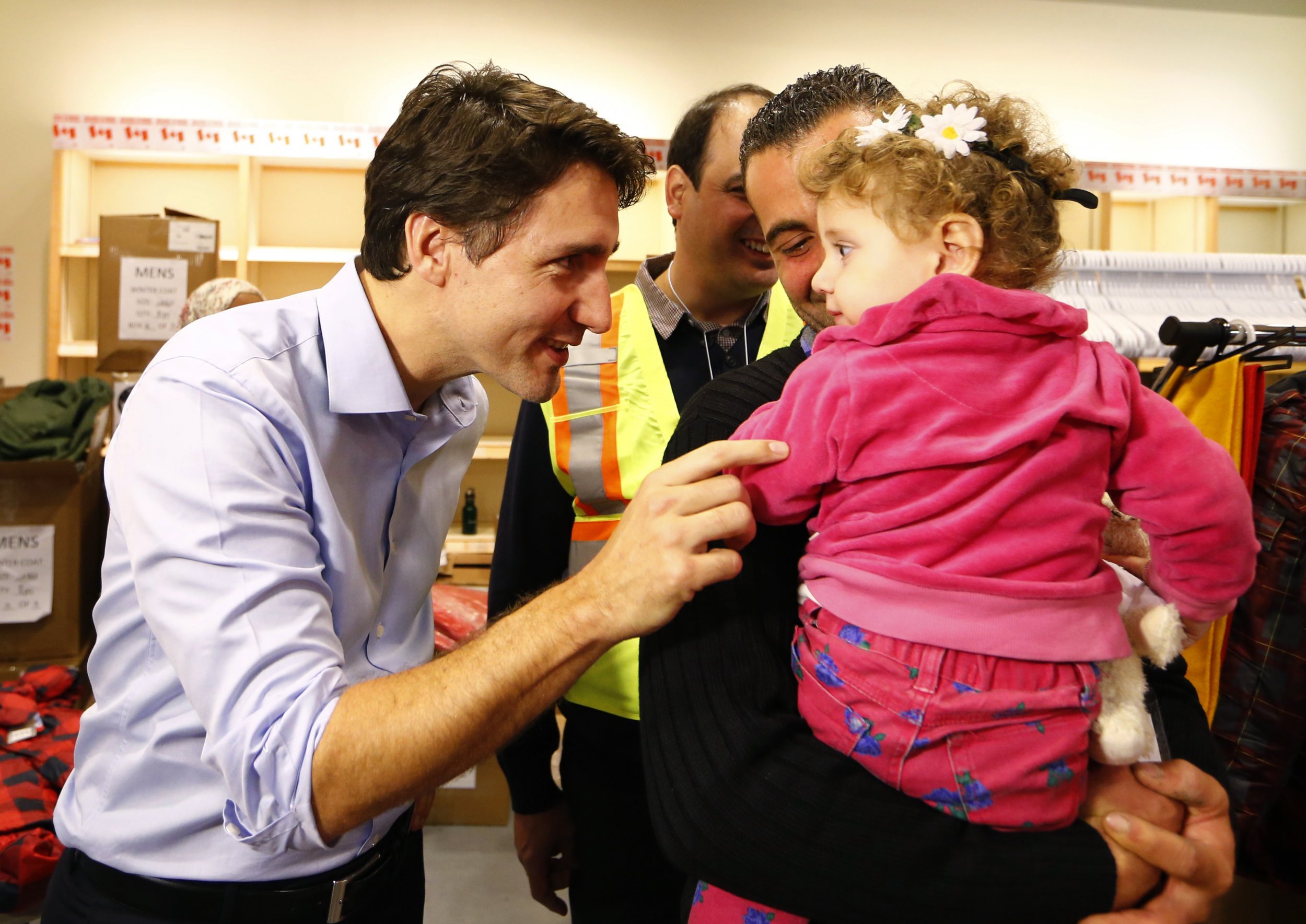 Canadian Prime Minister Justin Trudeau Greets First Intake Of Syrian ...