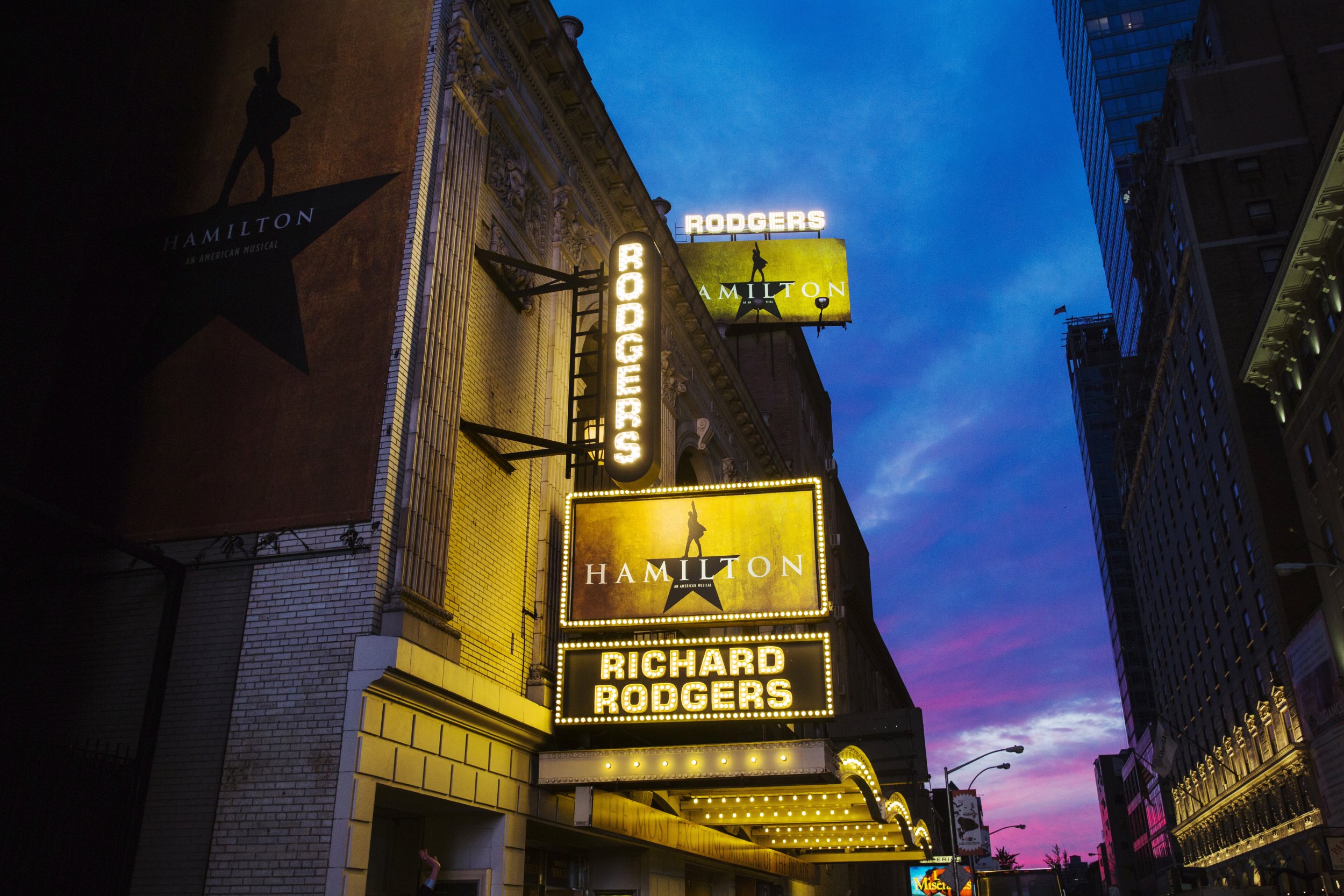 A marquee is lit up on the opening night of the musical play "Hamilton," on Broadway in ...