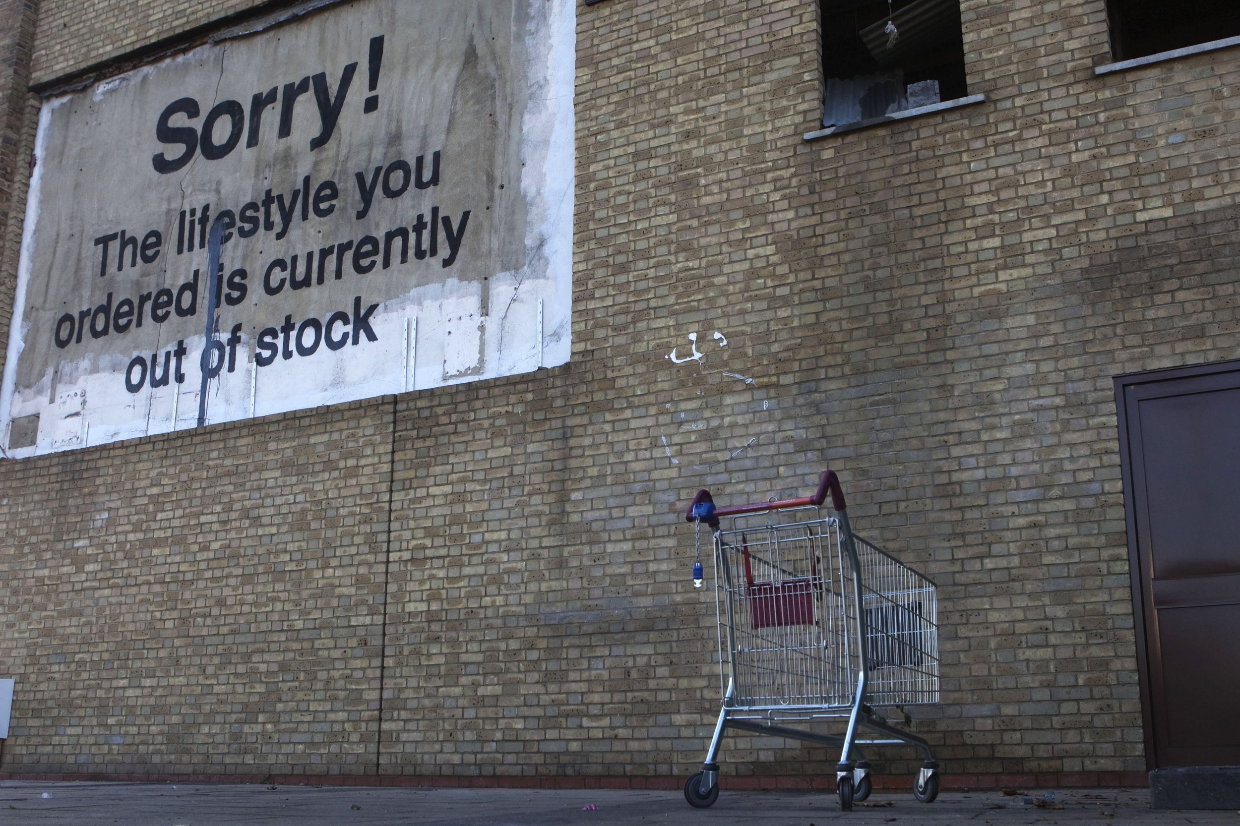 In Photos: Banksy Returns With Mural Criticizing Treatment of ...
