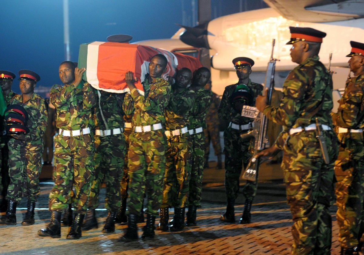 Kenyan soldiers unload the bodies of comrades who died in an Al-Shabab attack in Somalia.