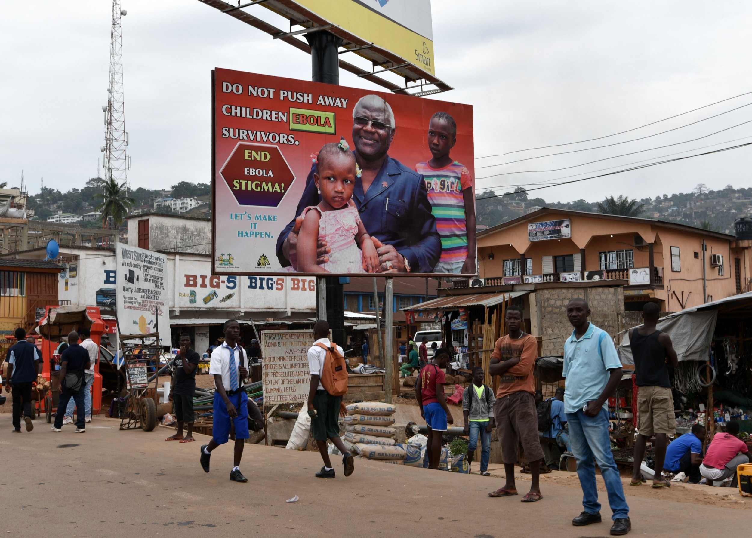 An Ebola poster in Sierra Leone featuring the president, Ernest Bai Koroma, is displayed.