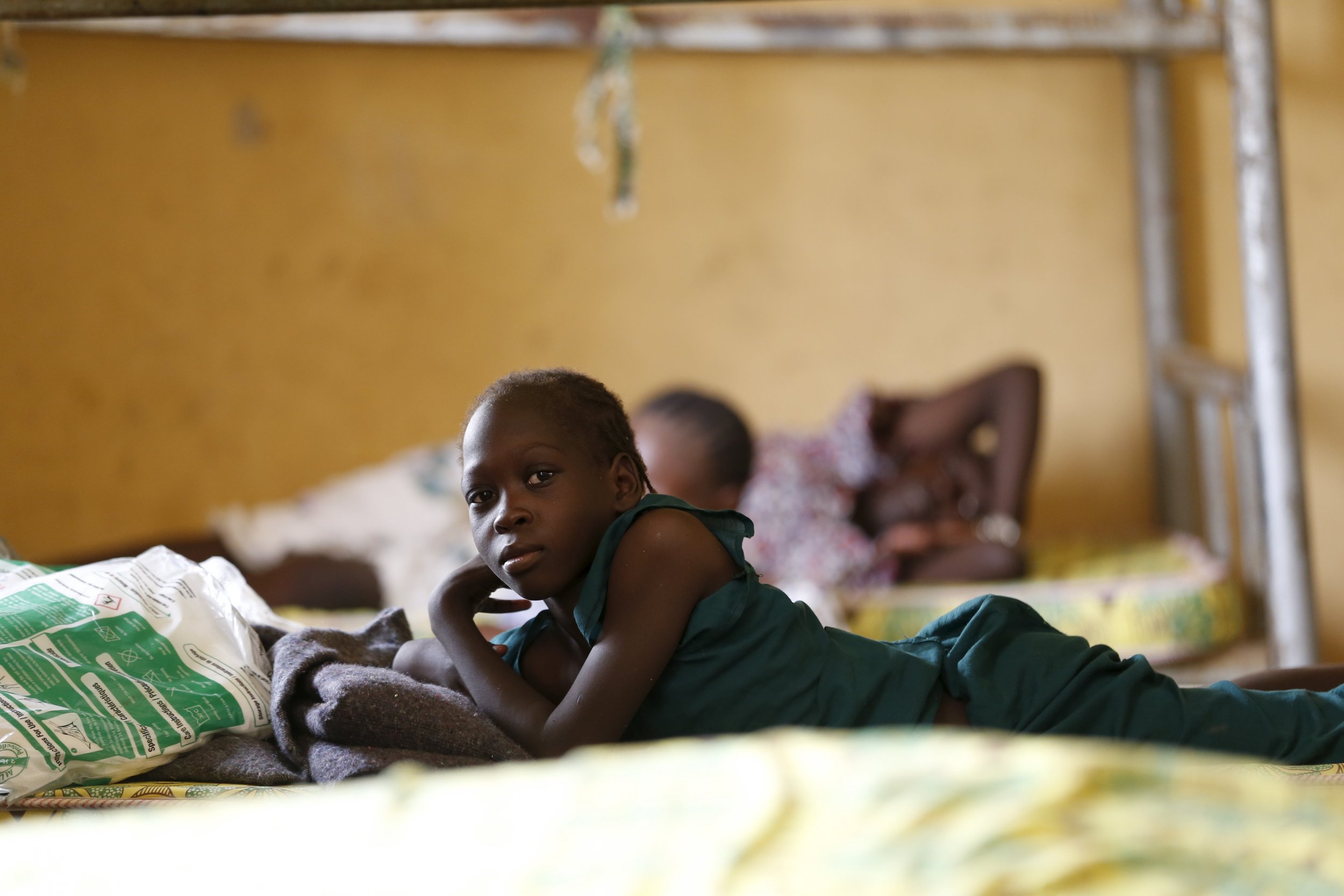 A child rescued from Boko Haram rests in an IDP camp in Yola, Nigeria.