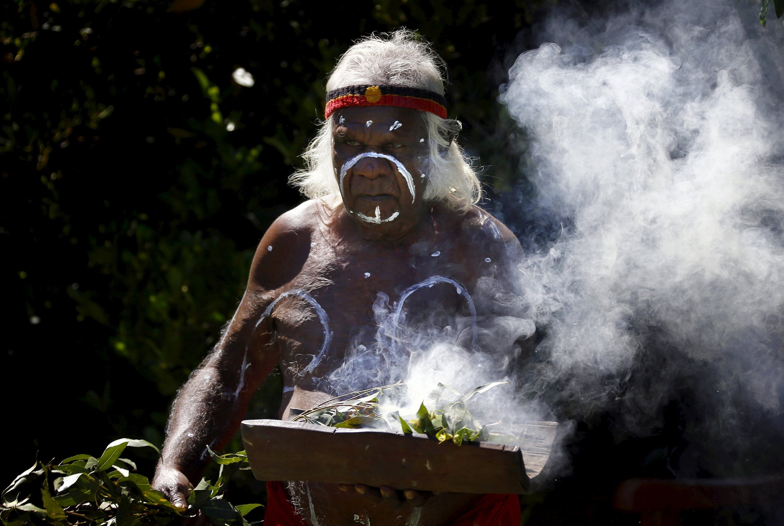 women-take-part-in-a-smoking-ceremony-during-the-arrival-of-mungo-man