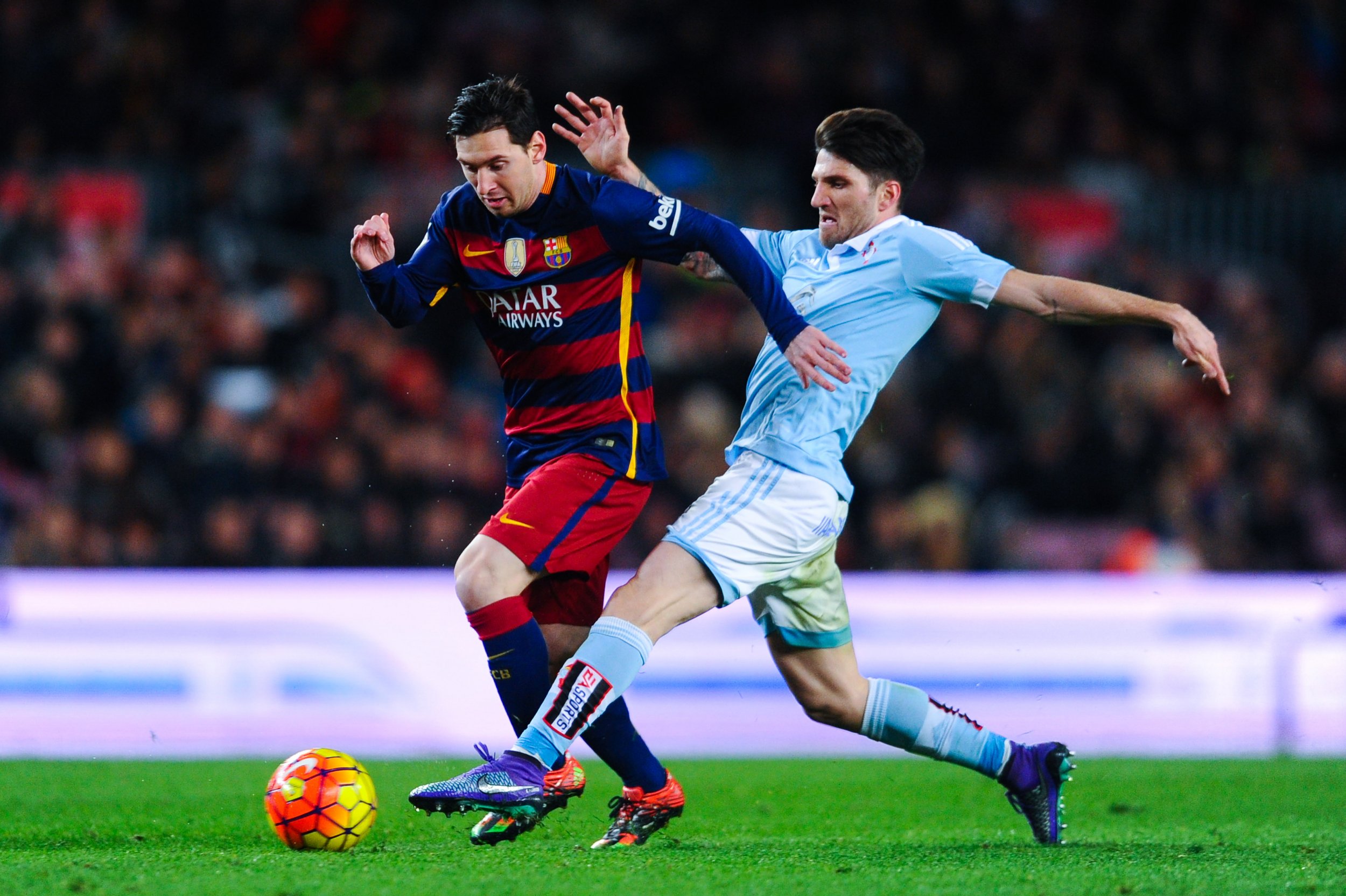 Lionel Messi, left, against Celta Vigo at Camp Nou.