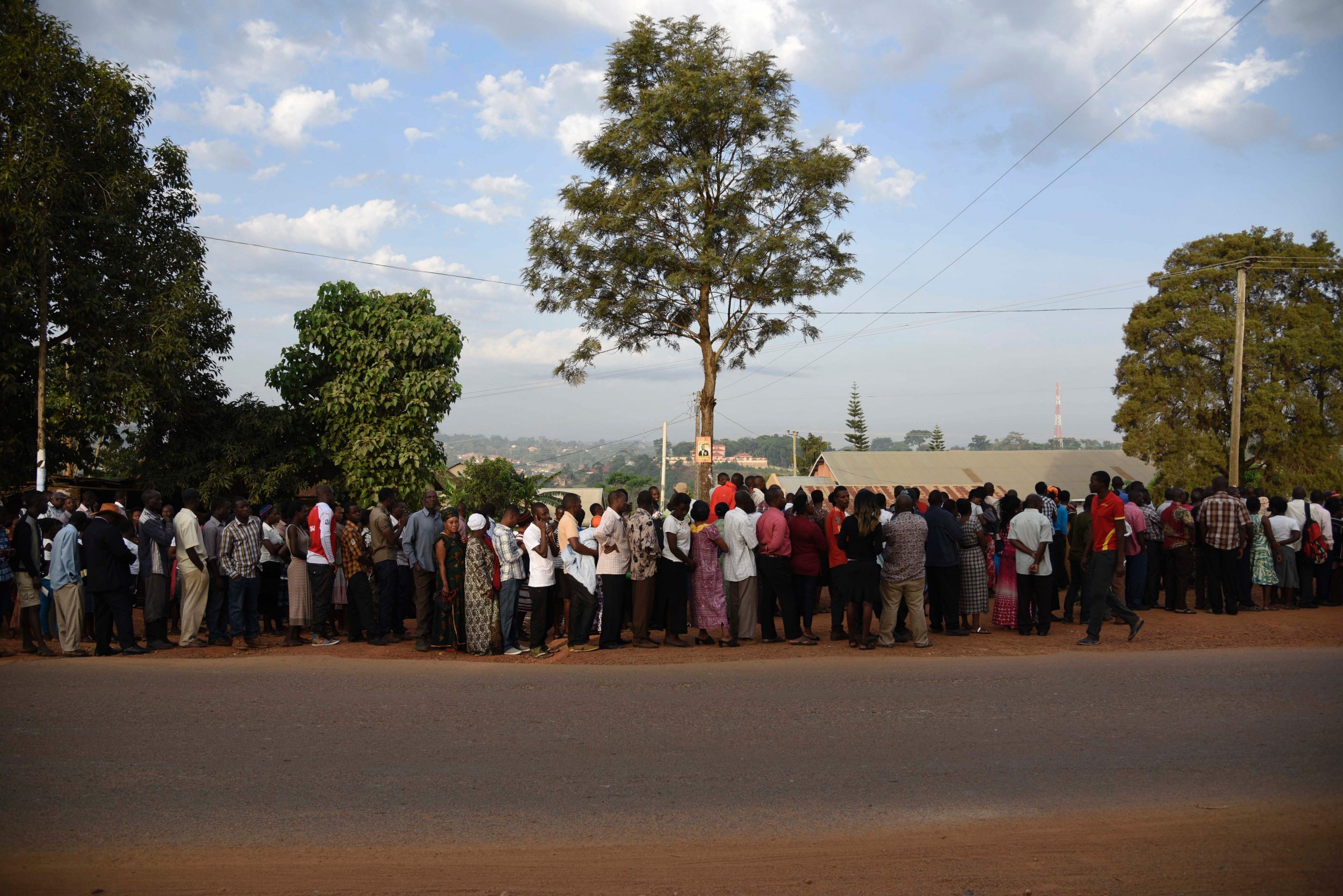 Ugandans queue up to vote.