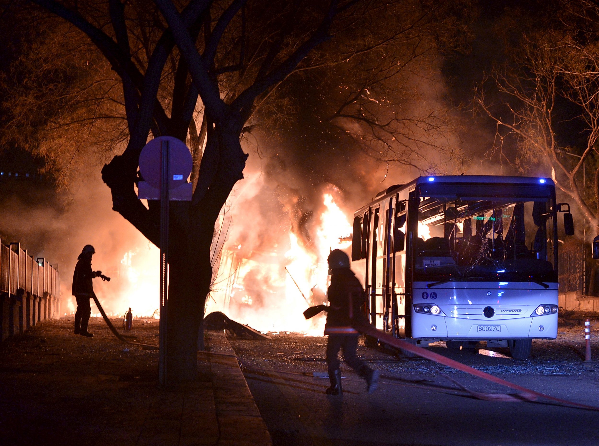 Firefighters tackle a fire in Ankara after an explosion.