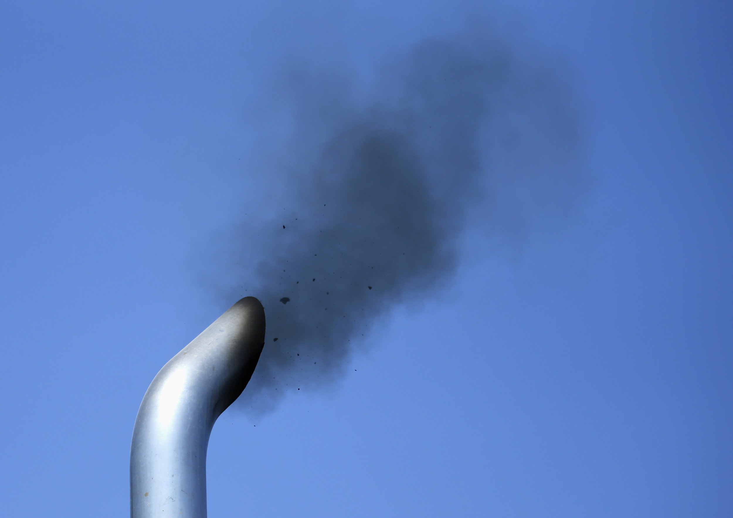 Truck exhaust pipe emits smoke