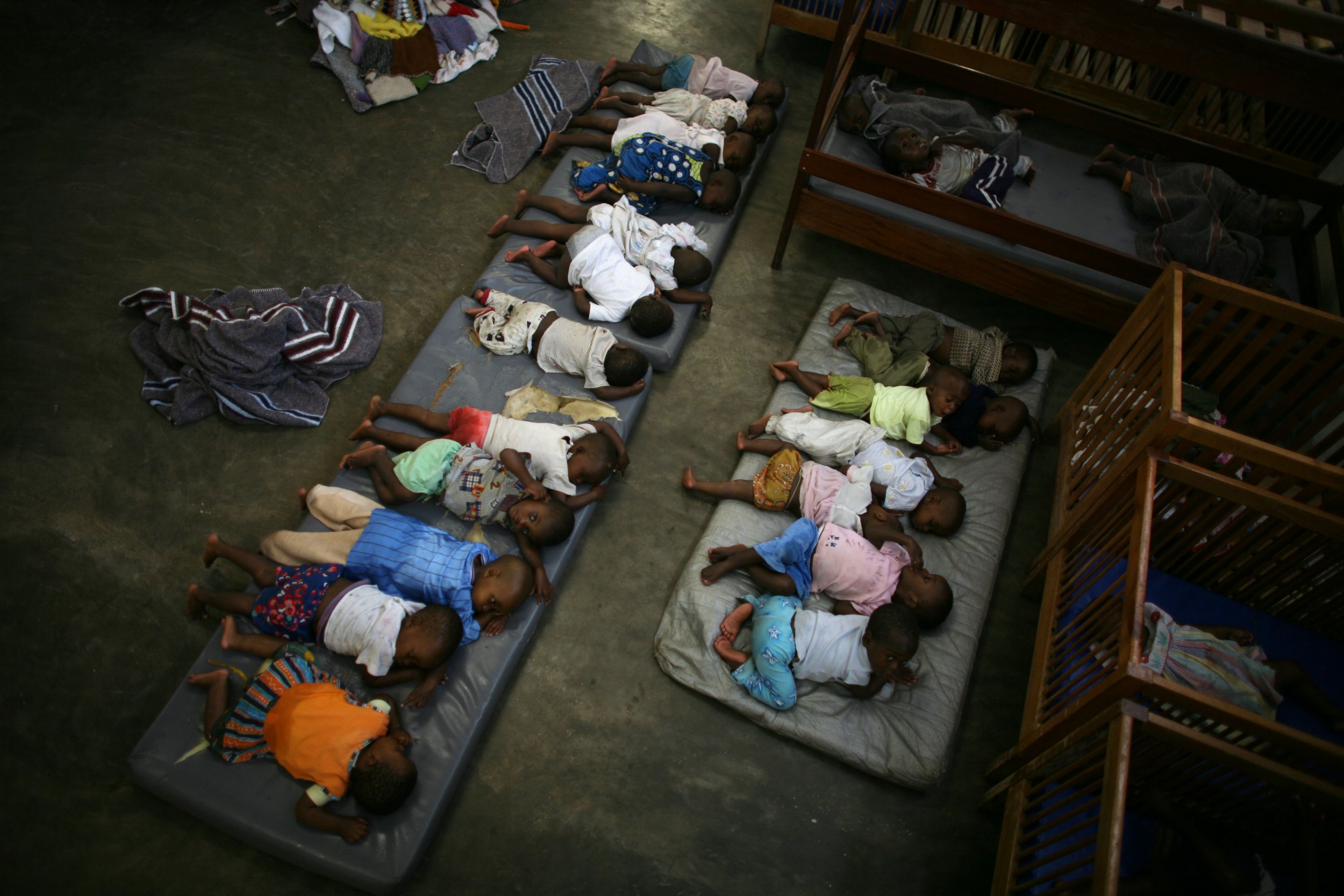 Congolese child refugees rest in a shelter in Goma.