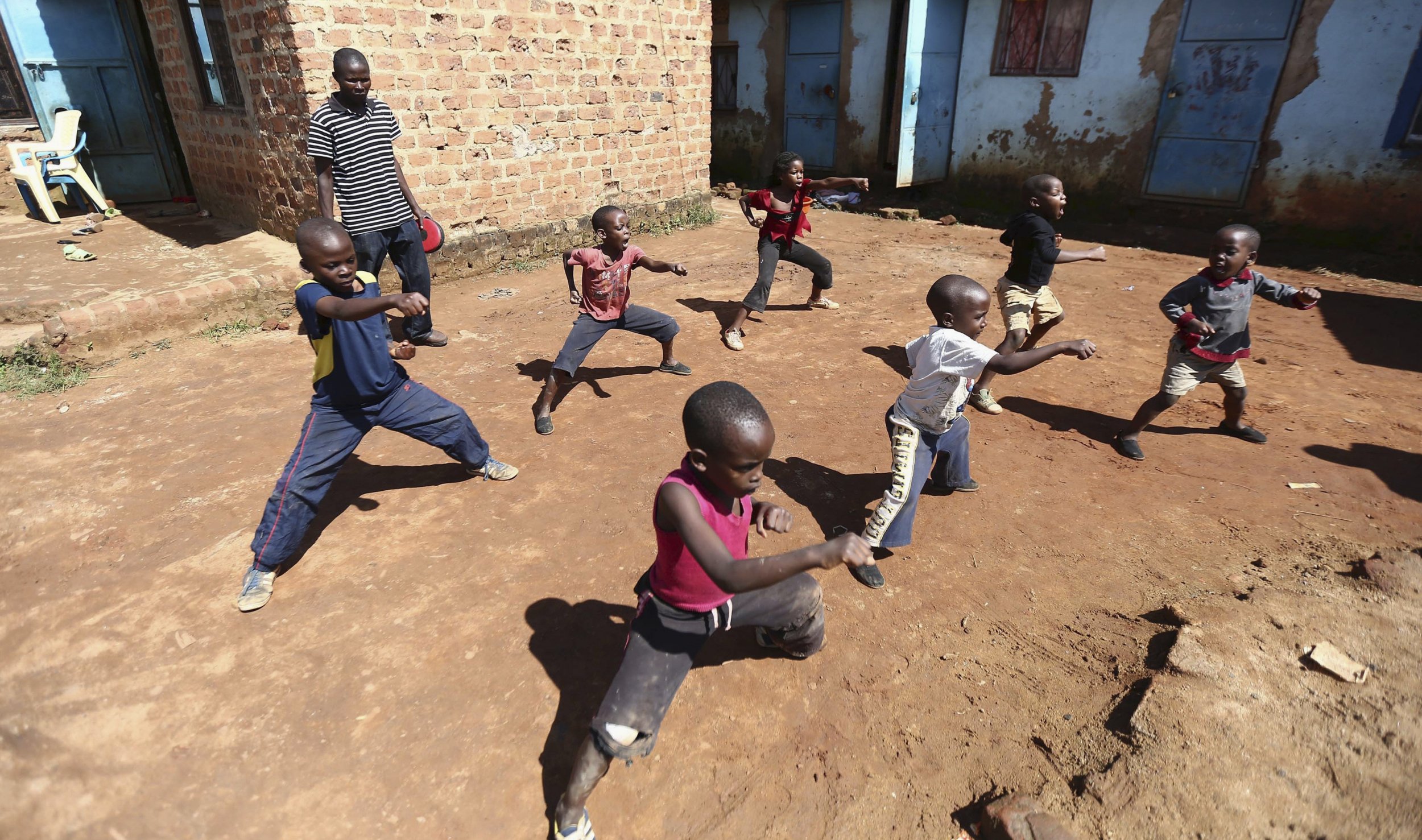 Ugandan children rehearse in a martial arts class in Kampala.