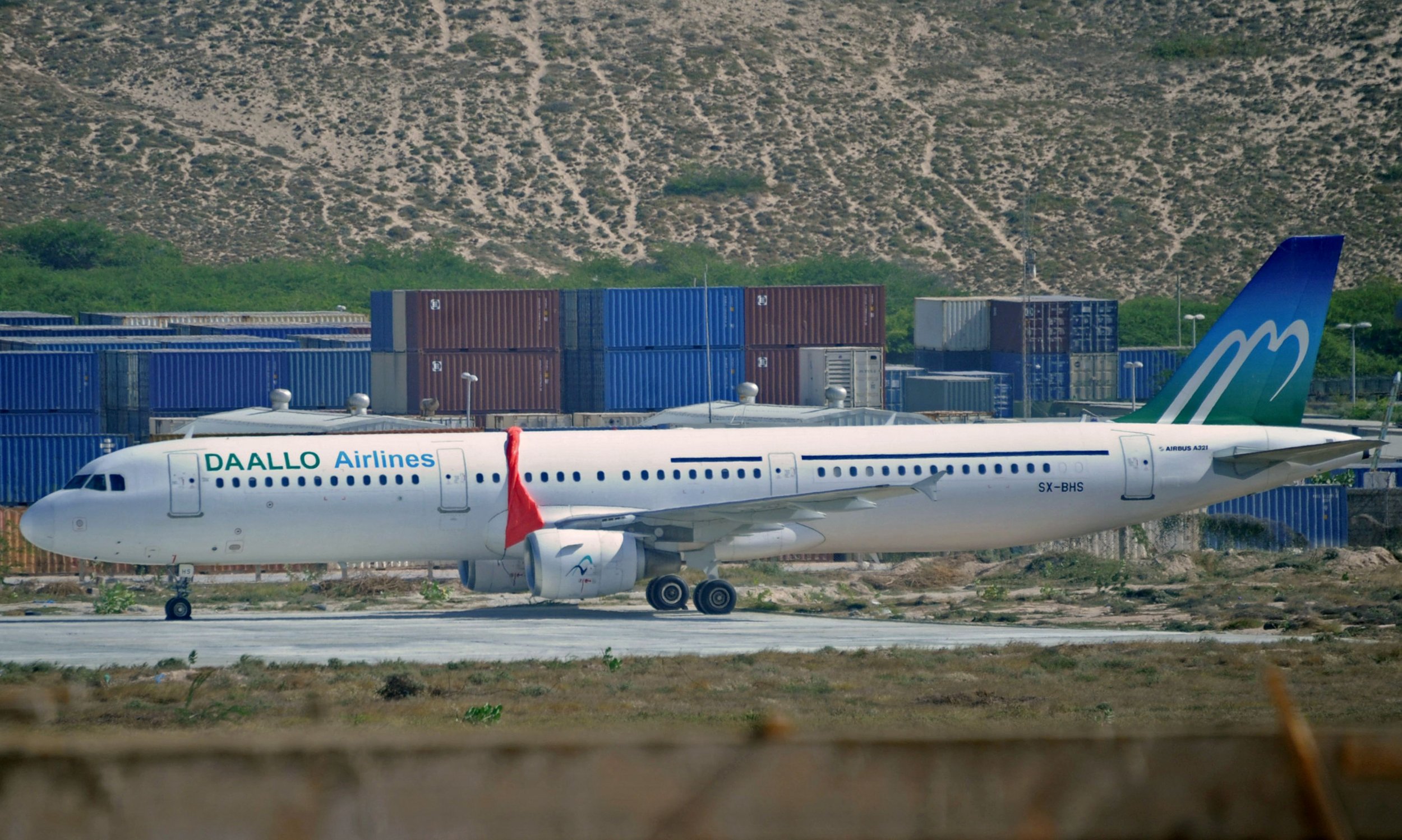 A Daallo Airlines flight sits in Mogadishu after Al-Shabab tried to blow it up.