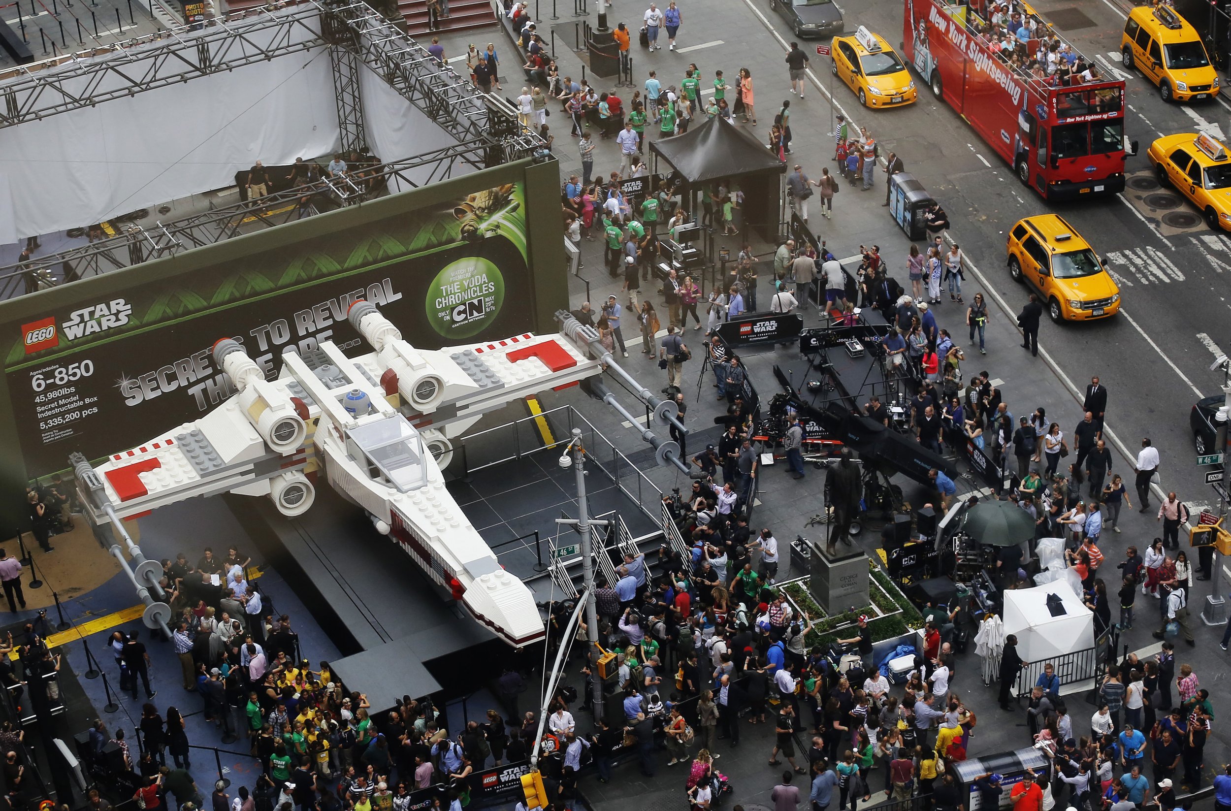 Star Wars X wing in Times Square surrounded by crowds