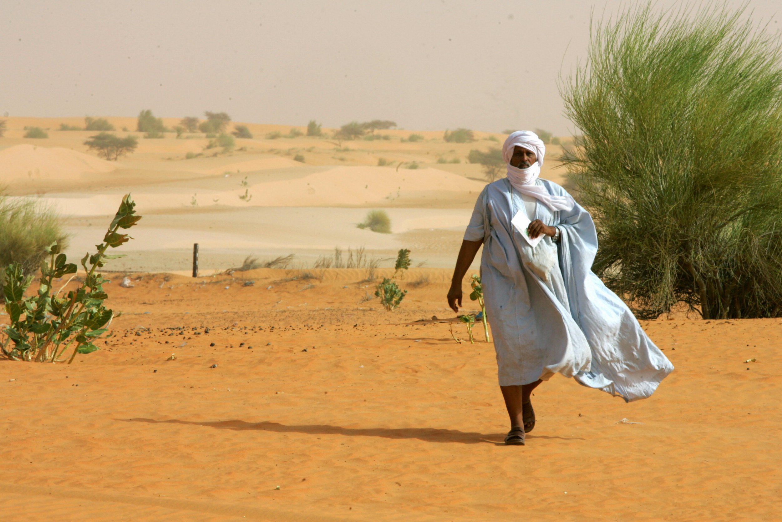 A Mauritanian voter walks to a polling station.