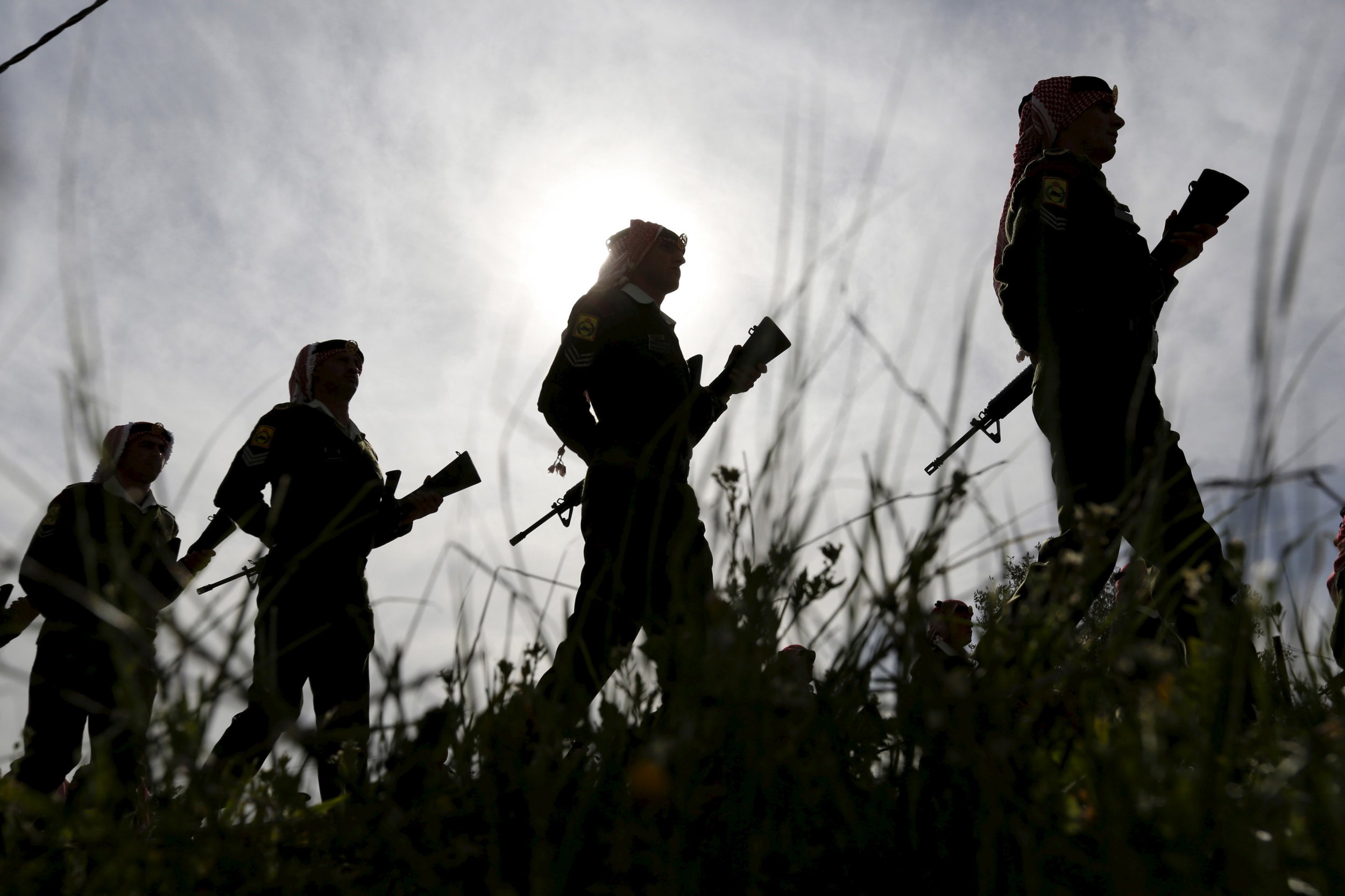 Jordanian soldiers' silhouttes in sunlight