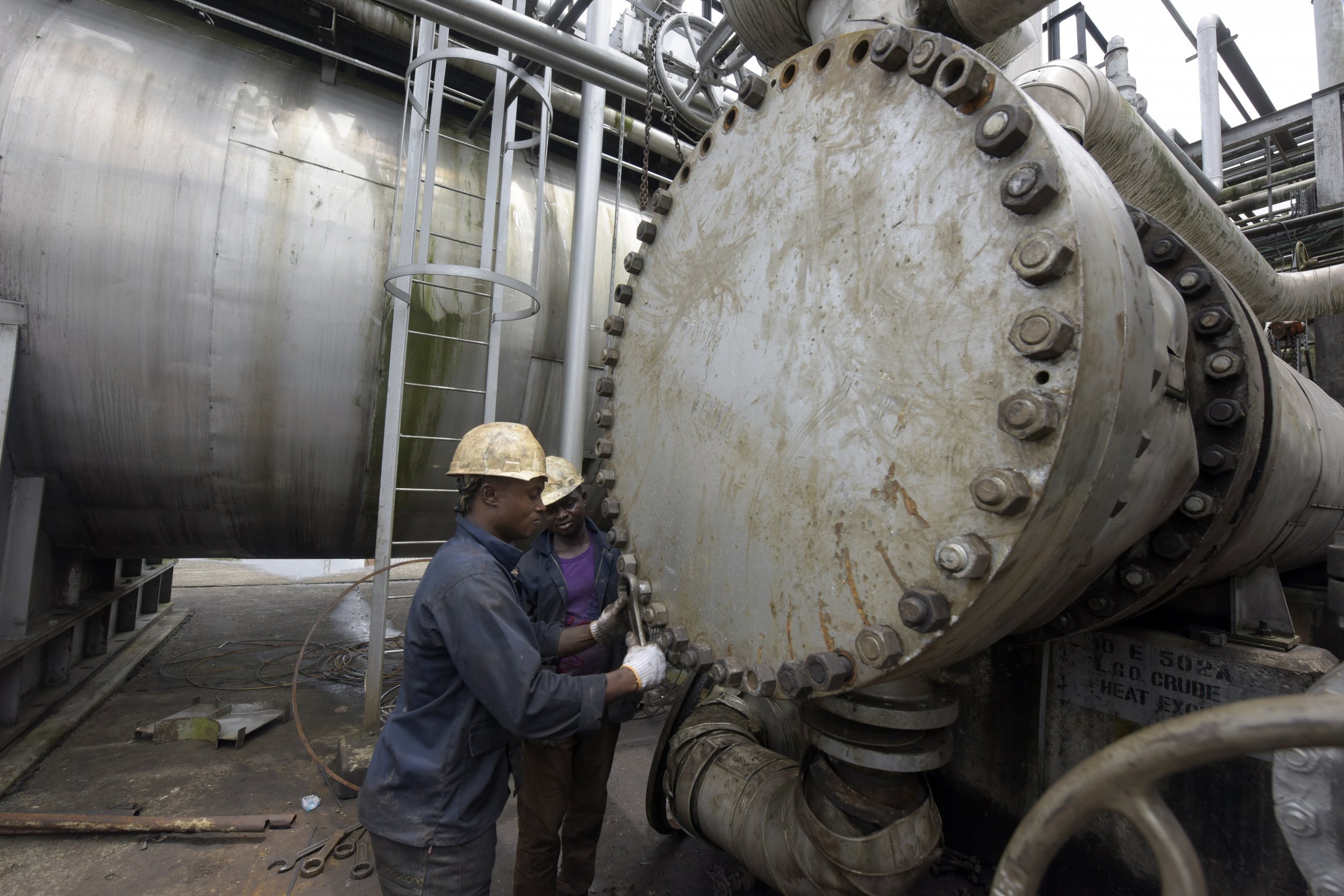 Nigerian oil workers at the Port Harcourt refinery.