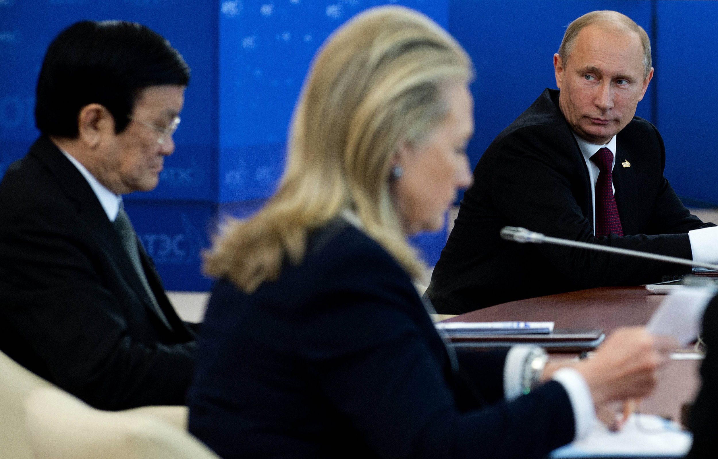 Putin and Hillary Clinton sit at summit