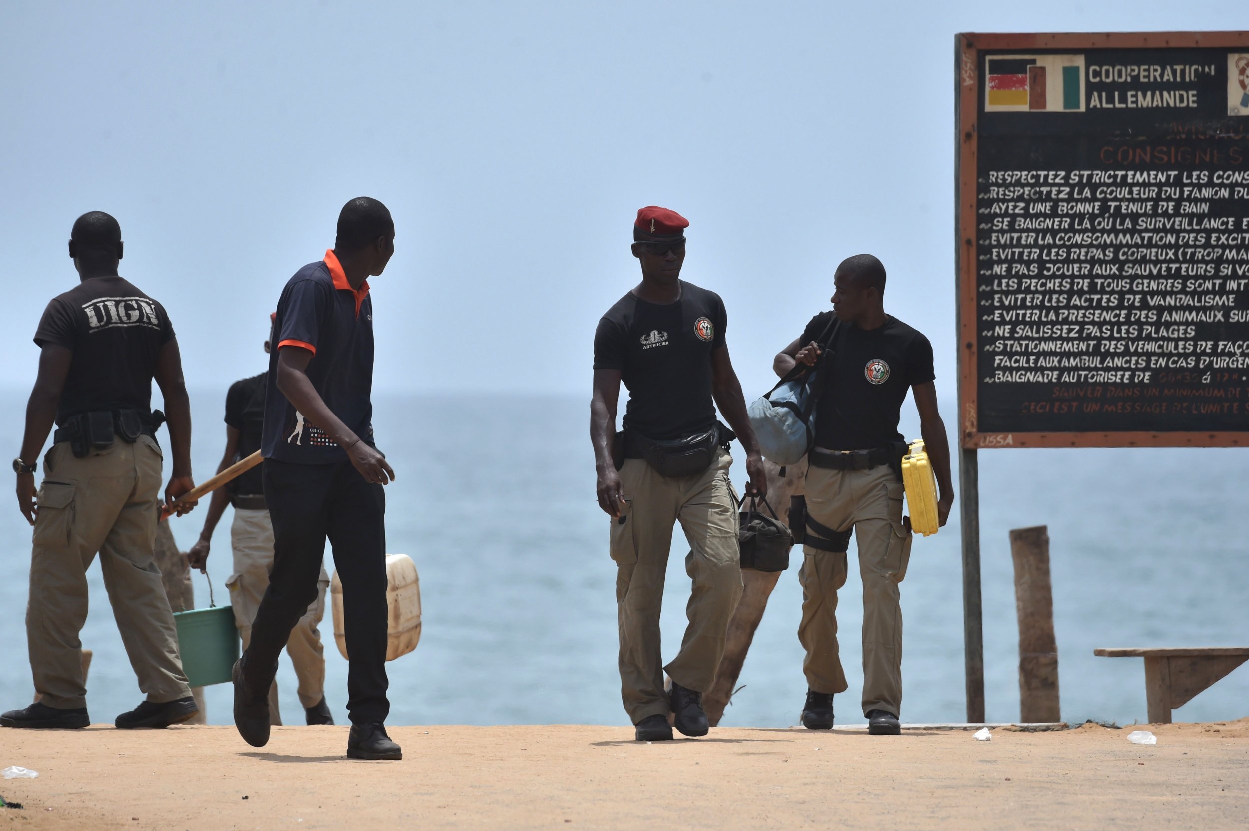 Mine clearance experts at the Grand Bassam beach resort in Ivory Coast.