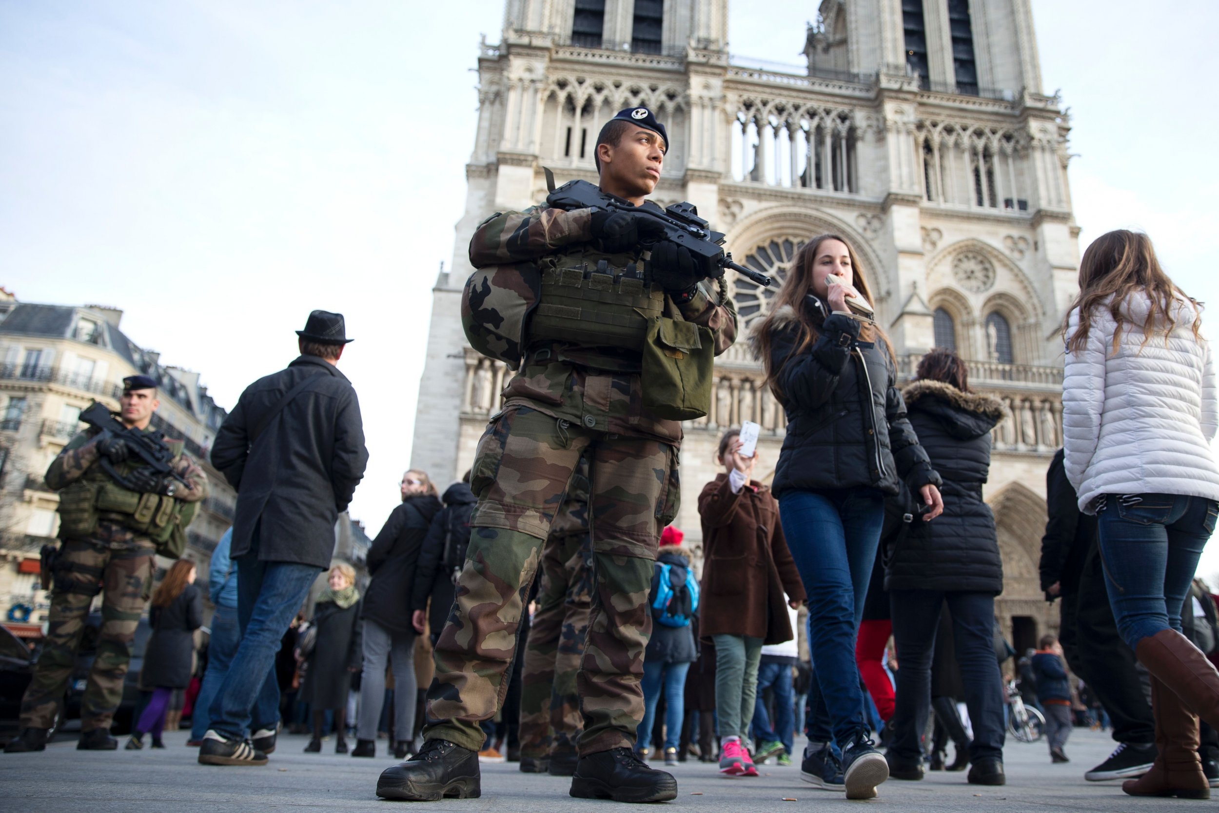 French soldiers patrol outside Notre Dame.