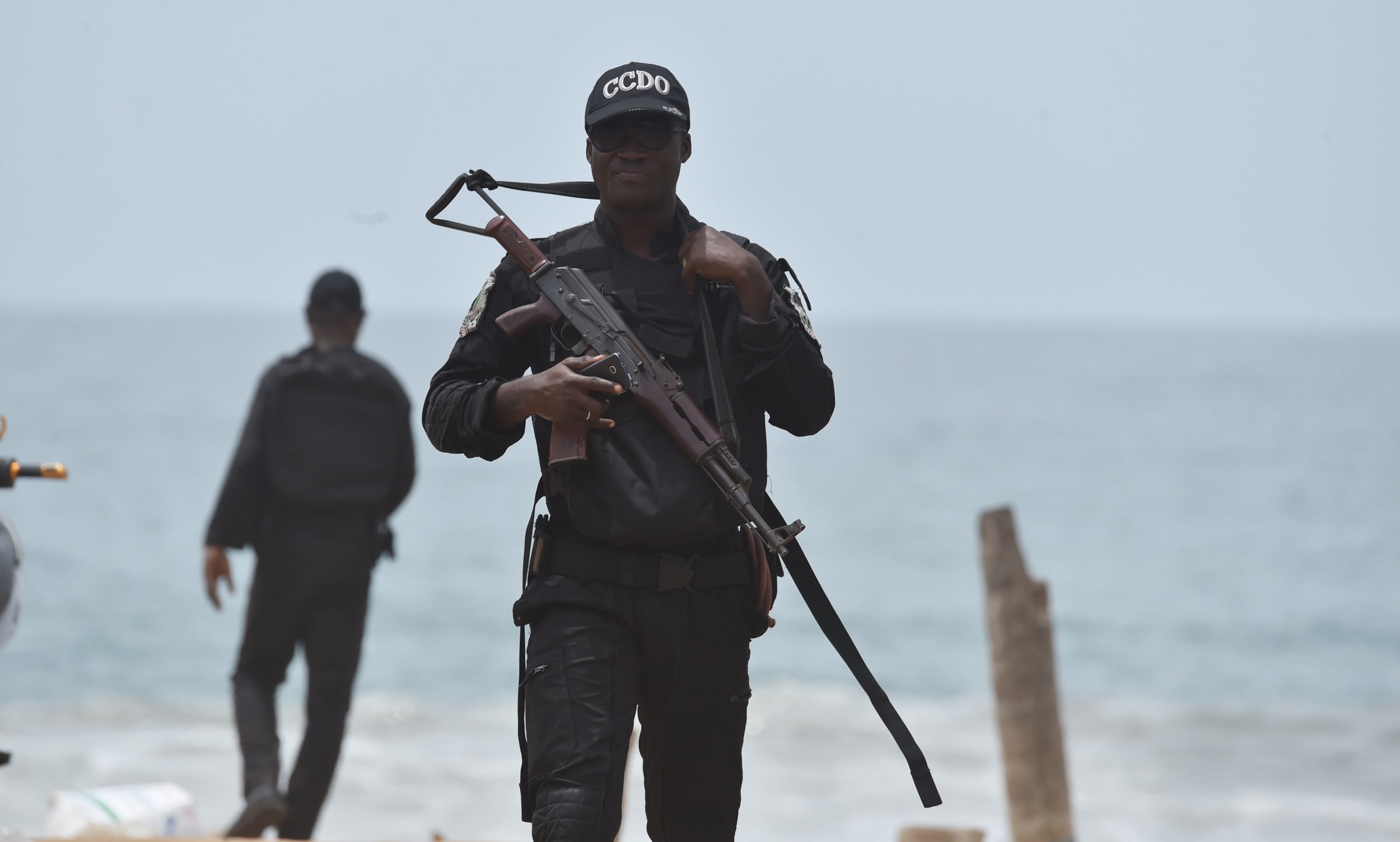 A soldier patrols on the beach in Grand Bassam, Ivory Coast, after an Al-Qaeda attack.