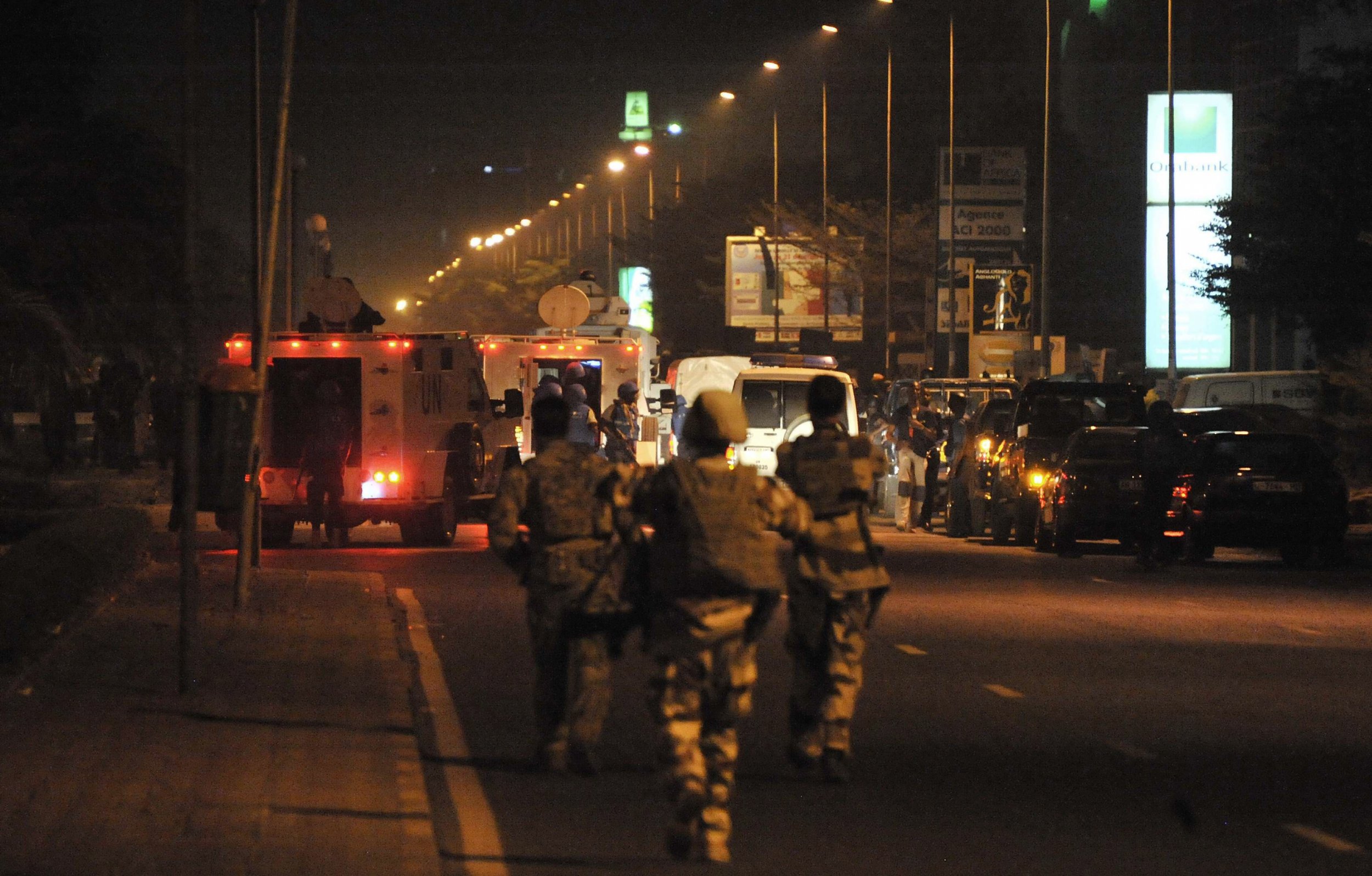 European soldiers are seen after an attack on a hotel in Bamako, Mali.