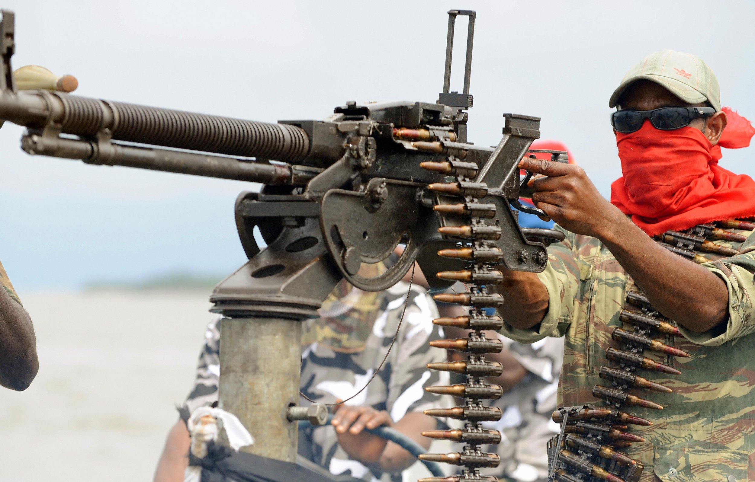 A MEND militant poses in the Niger Delta.