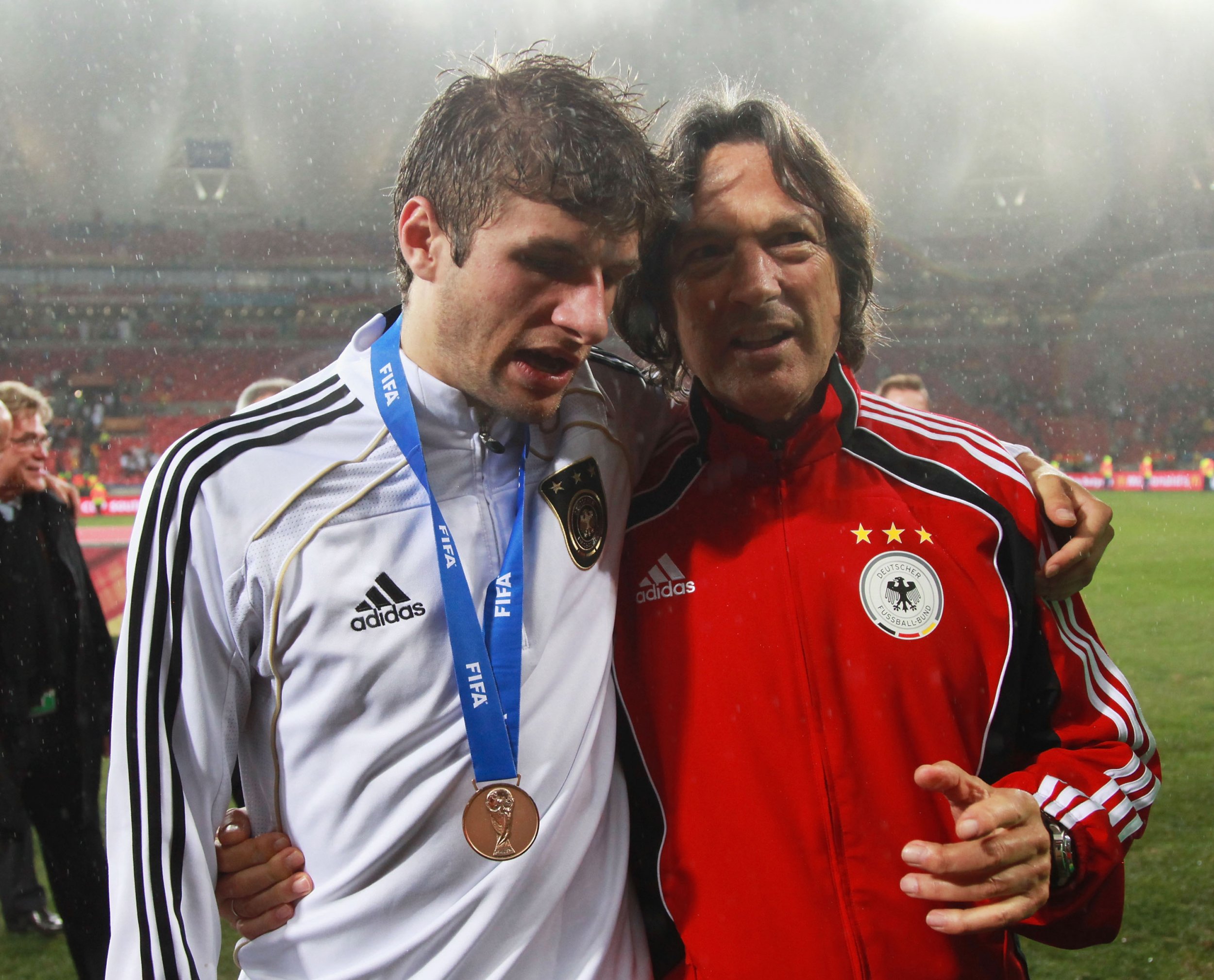 Hans-Wilhelm Muller-Wohlfahrt, right, is the Germany team doctor.