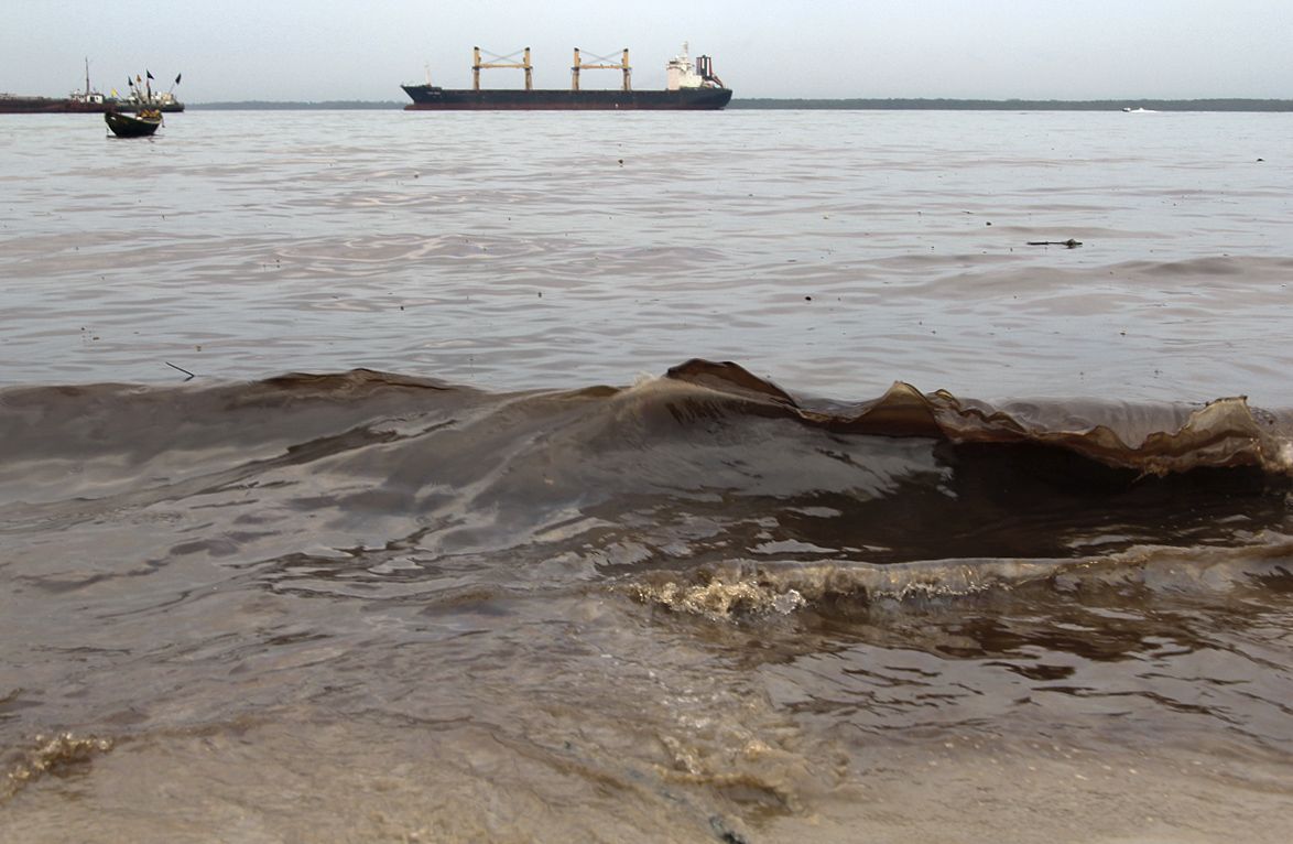 Oil washes up after a pipeline leak in the Niger Delta.