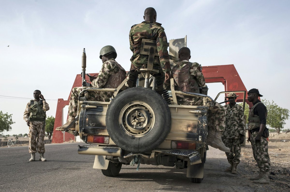 Nigerian soldiers prepare a convoy in Maiduguri