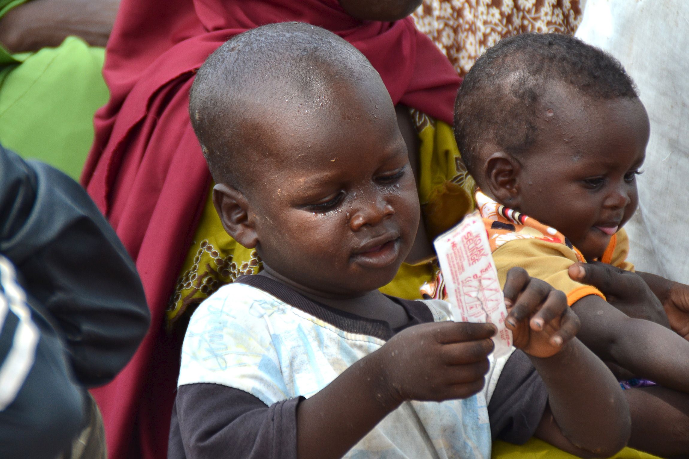 A child freed from Boko Haram awaits medical treatment.