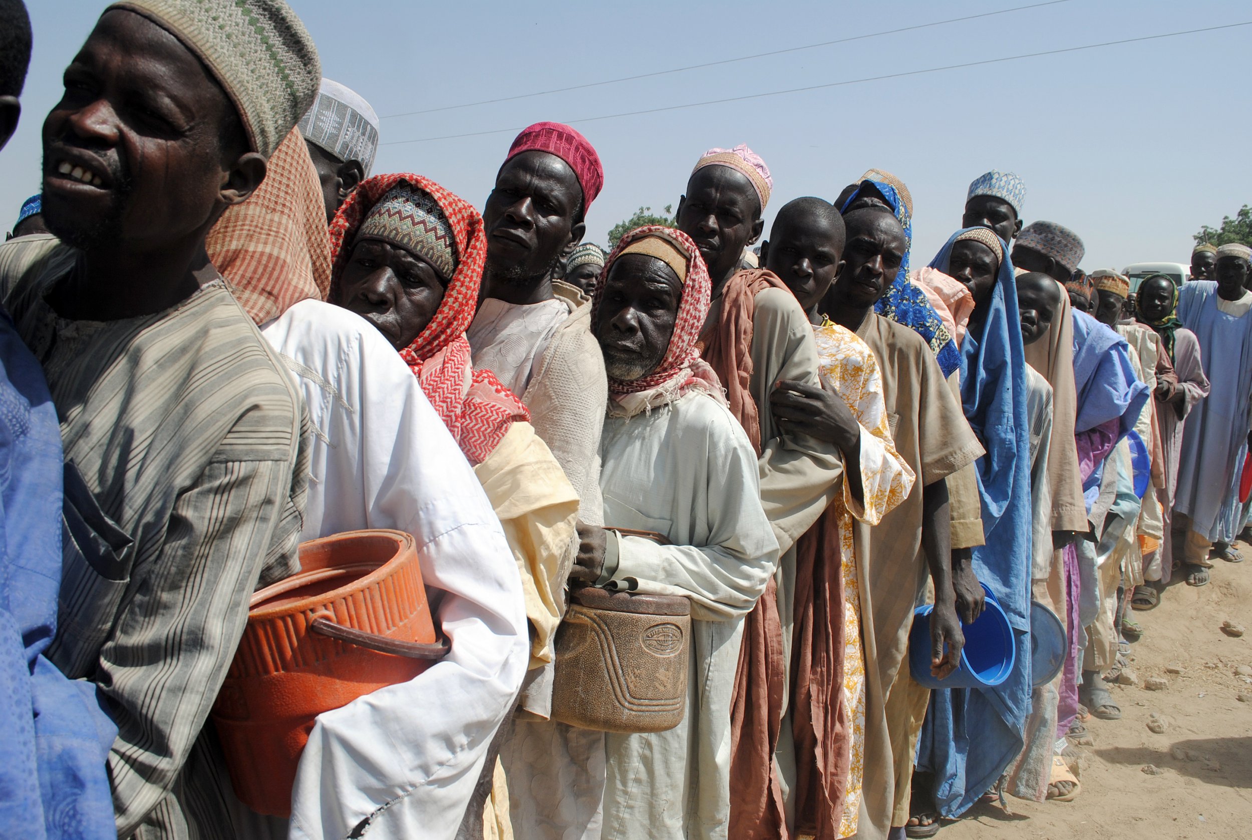 People displaced by Boko Haram queue for food in Dikwa Camp, Borno, Nigeria.