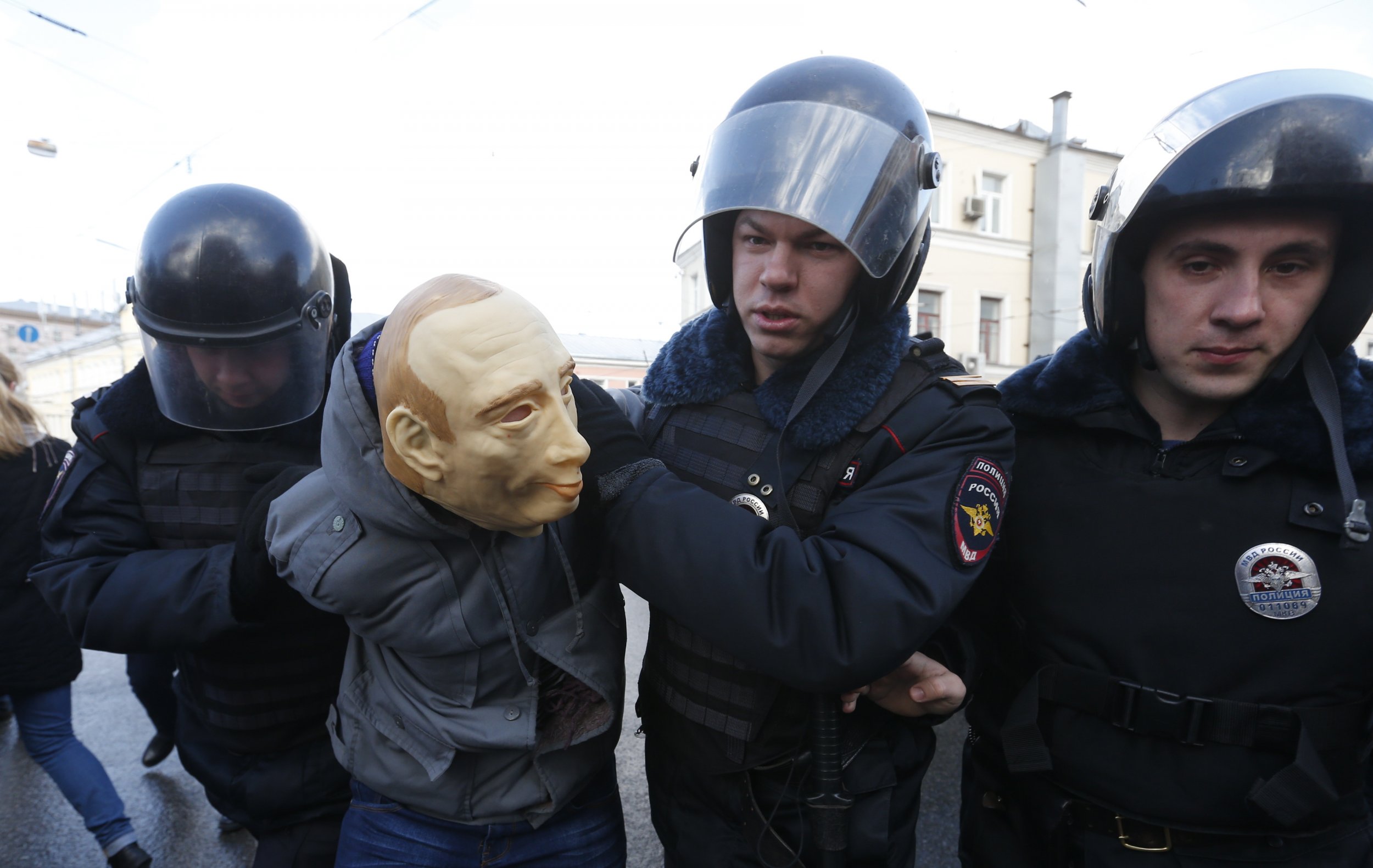 Putin mask arrest