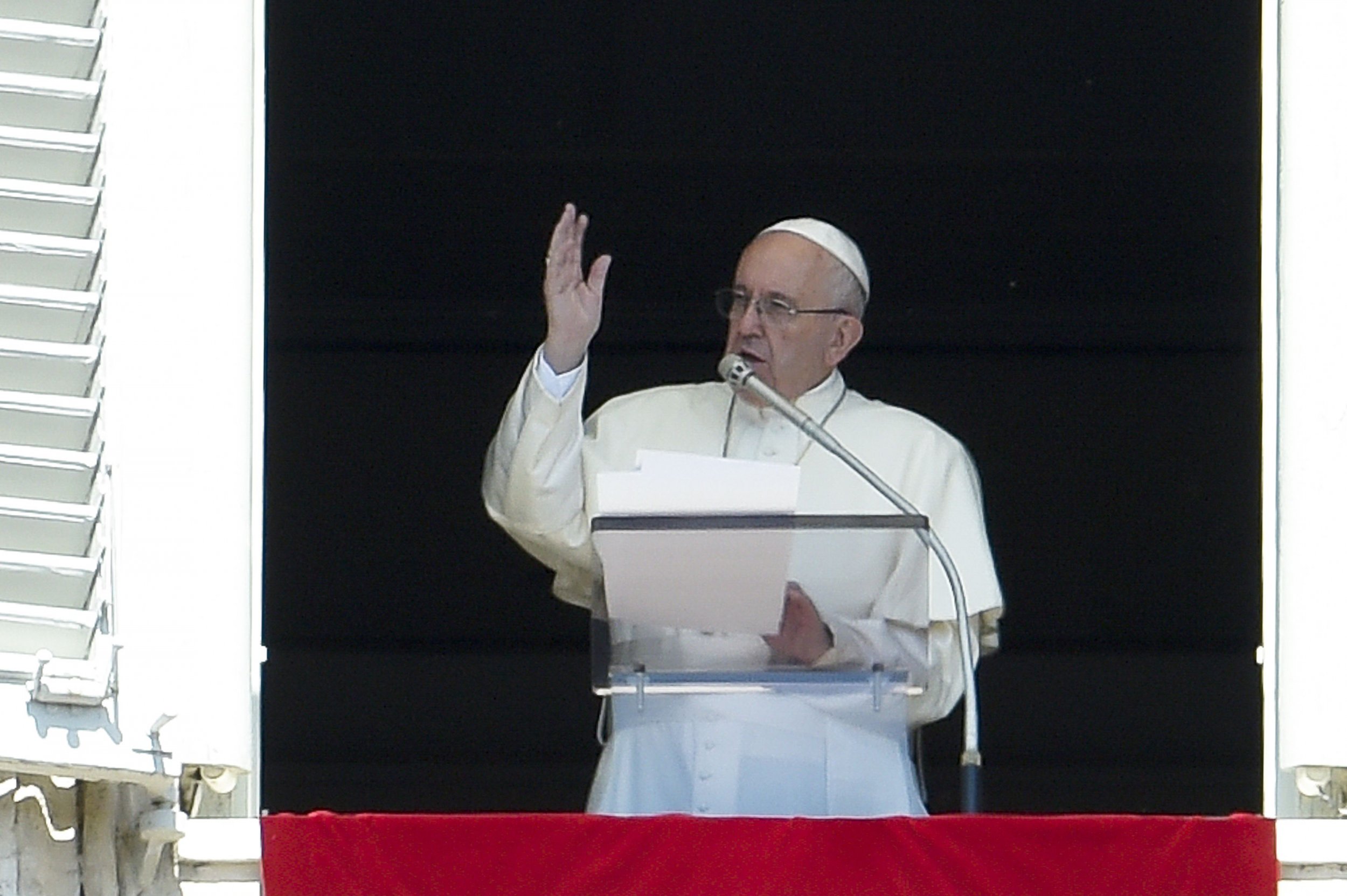 Pope Francis blesses the faithful in St Peter's Square.