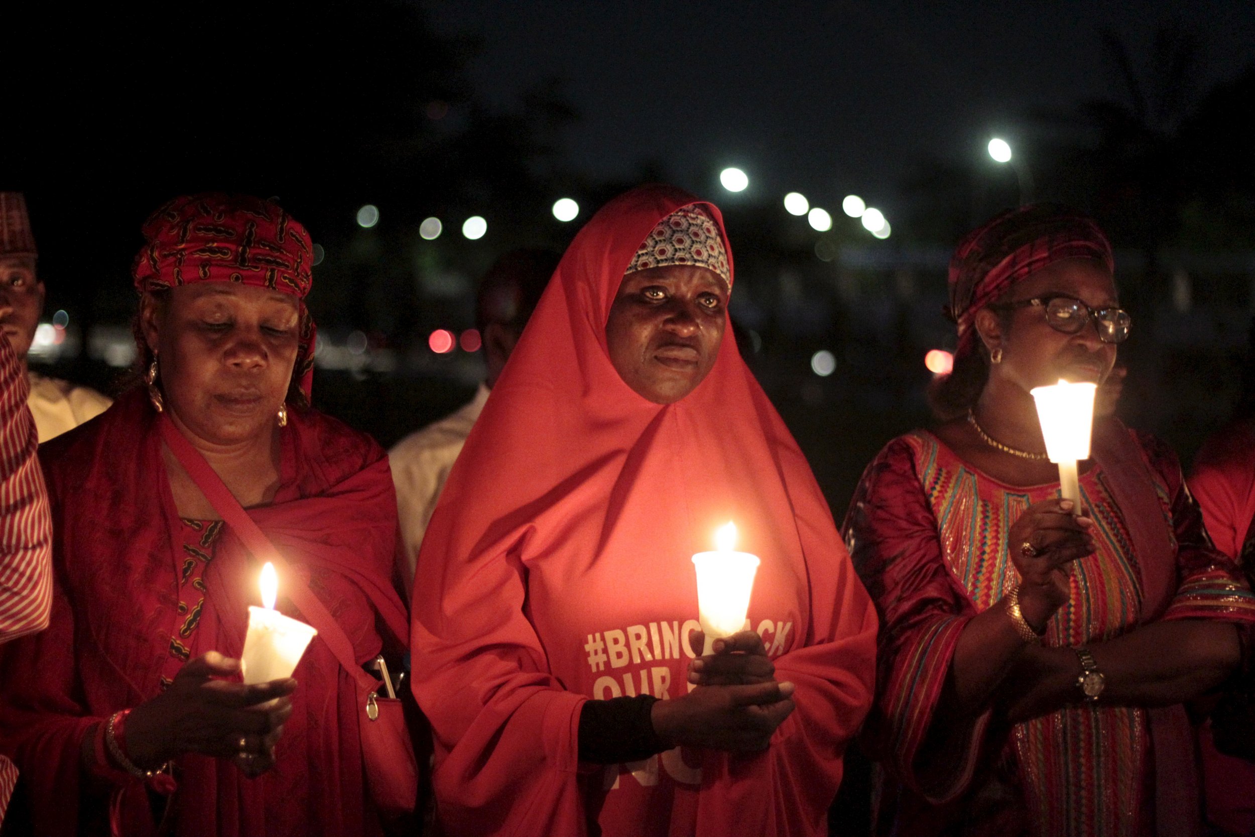Bring Back Our Girls campaigners light candles.