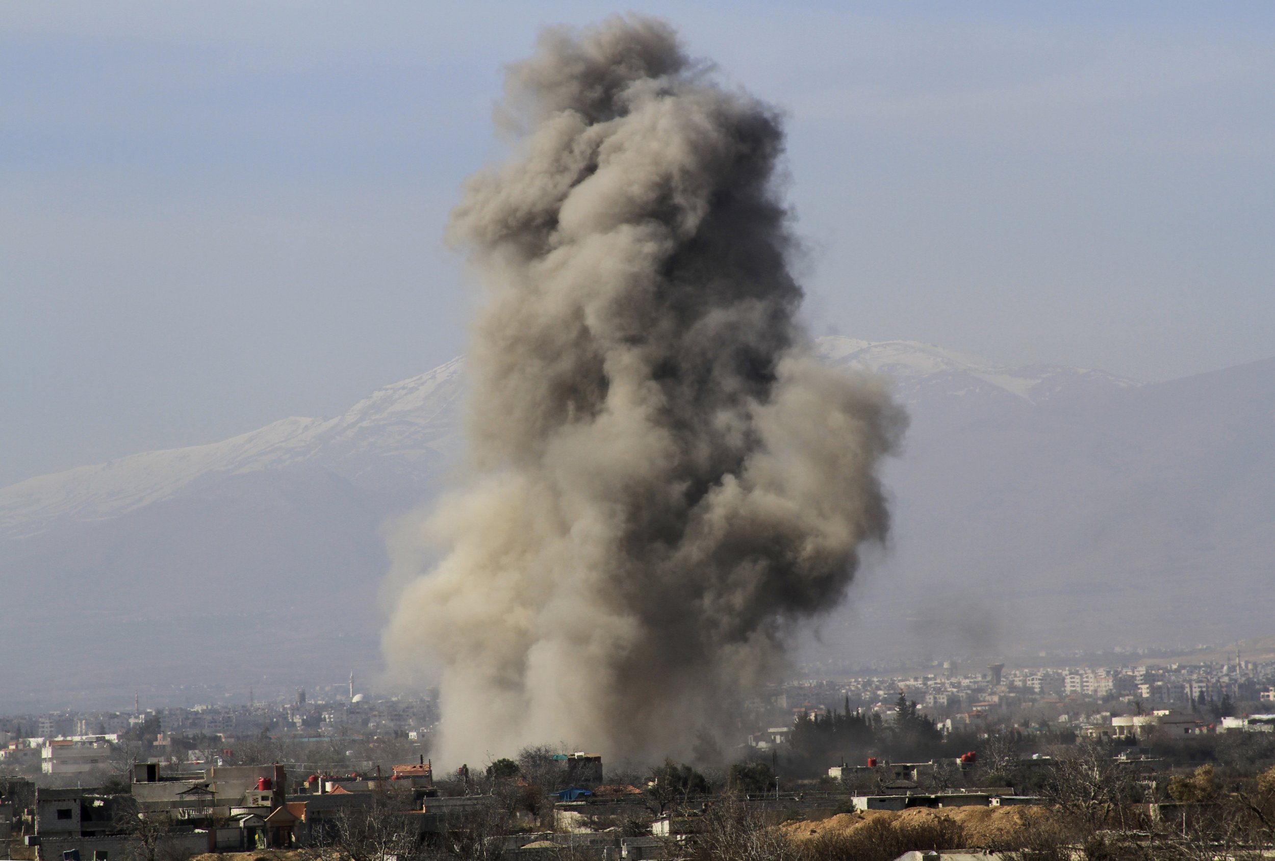 Smoke from barrel bombs