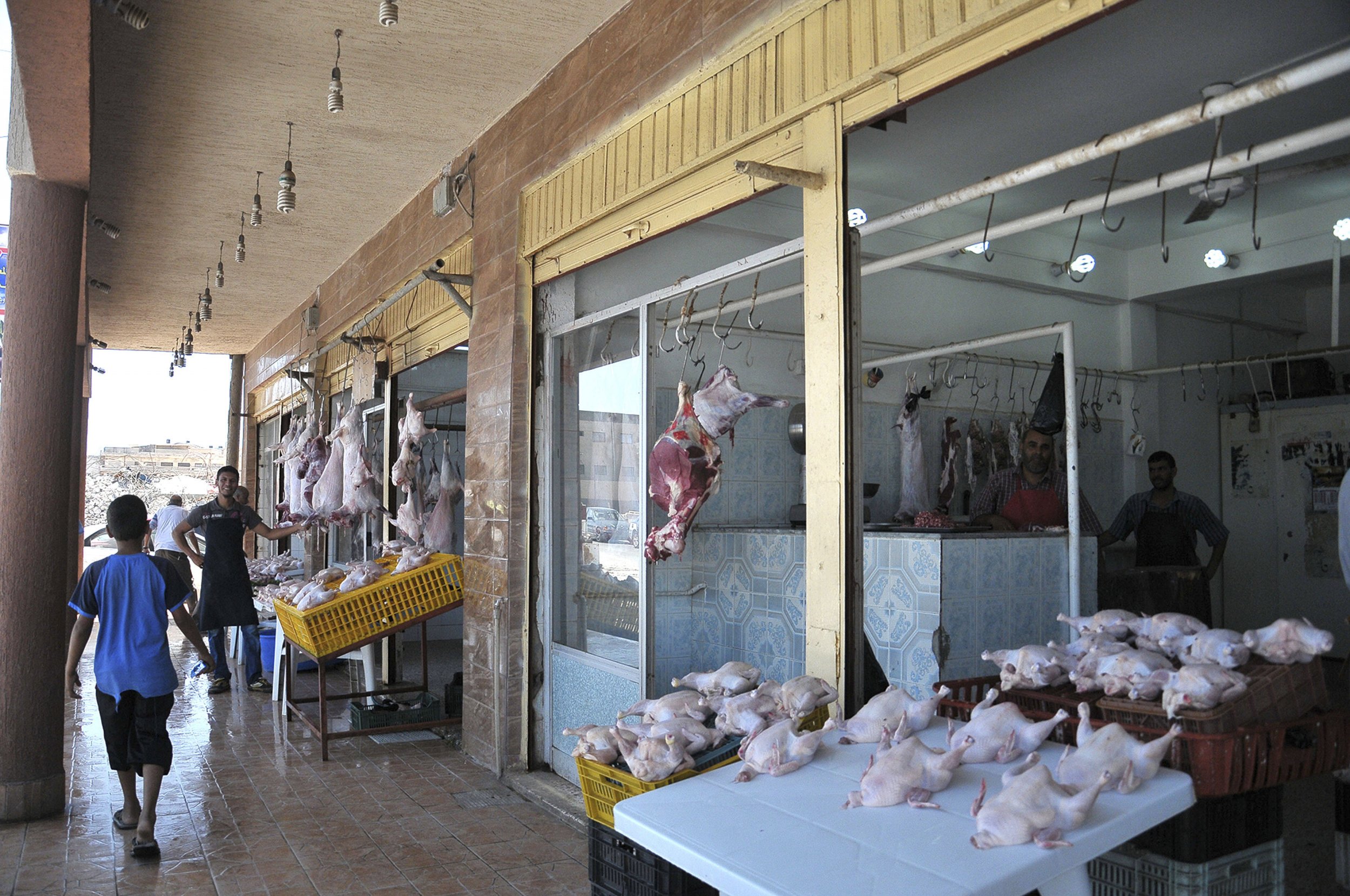 Selling meat in Derna, Libya
