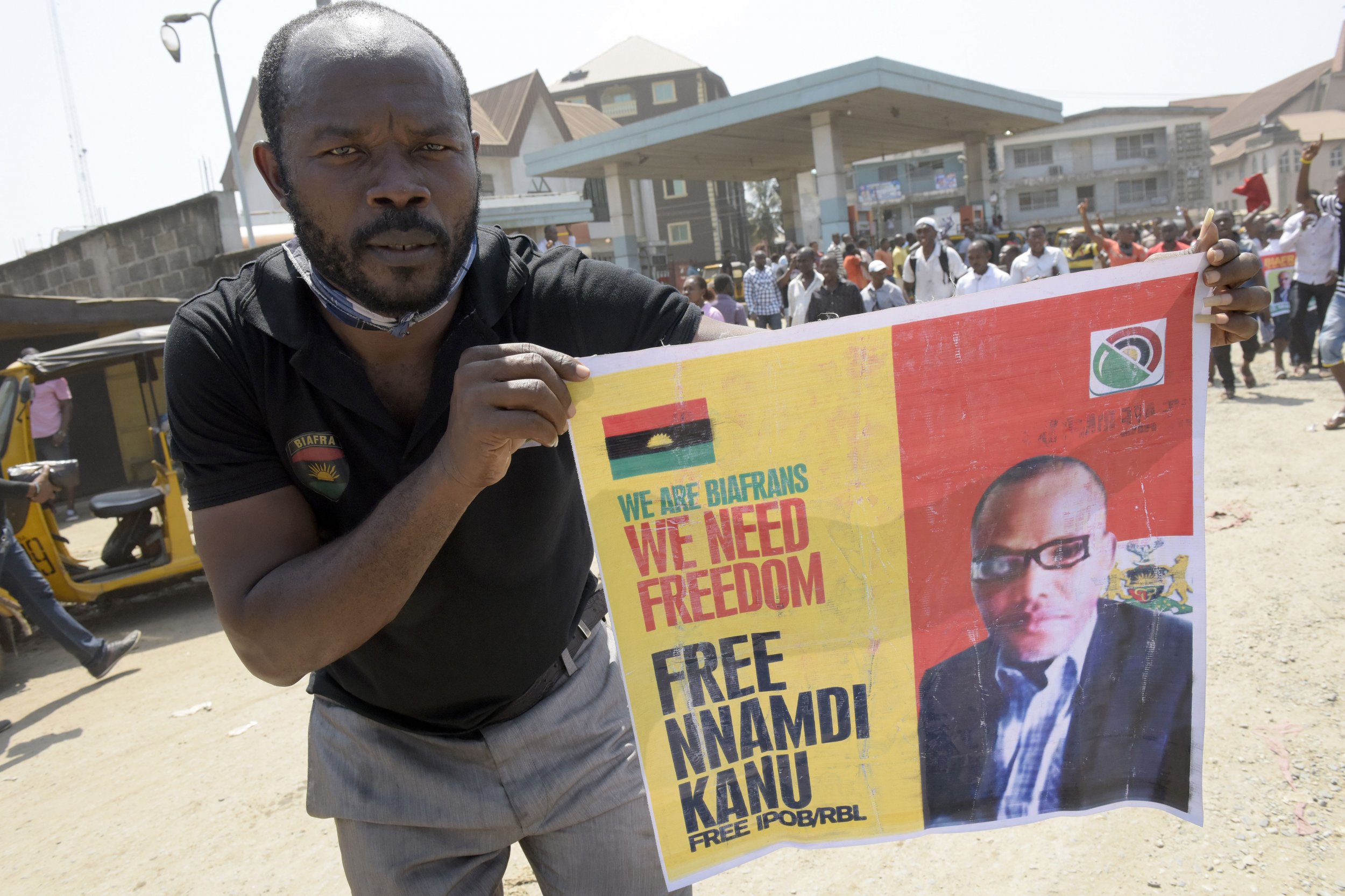 Pro-Biafra activist with Nnamdi Kanu poster.