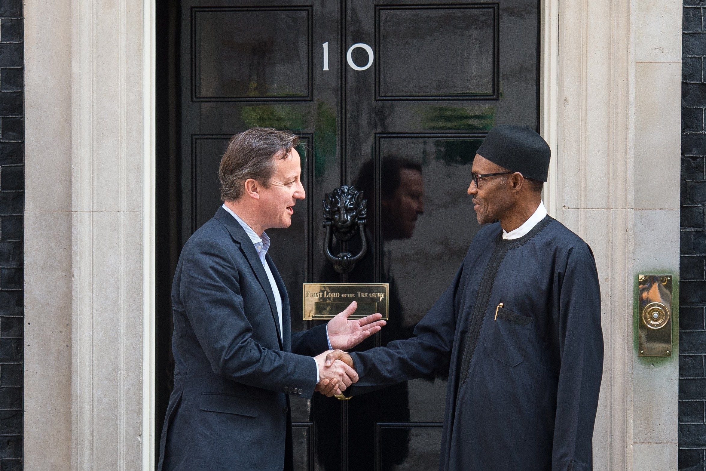 Muhammadu Buhari shakes hands with David Cameron