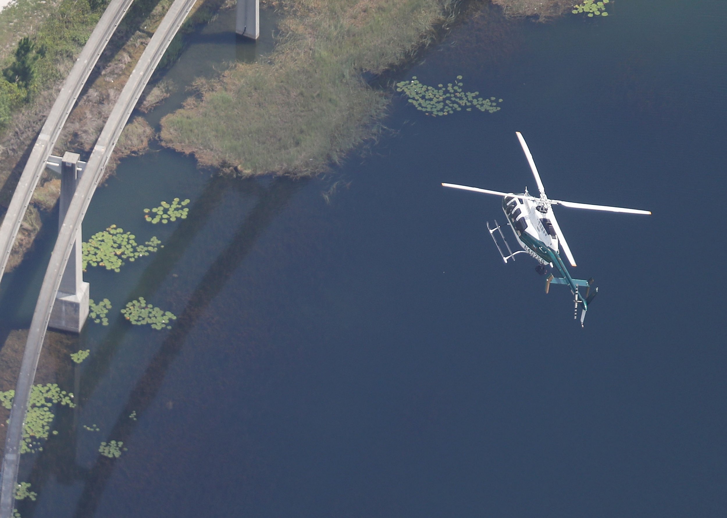 Disney helicopter searches for boy taken by alligator