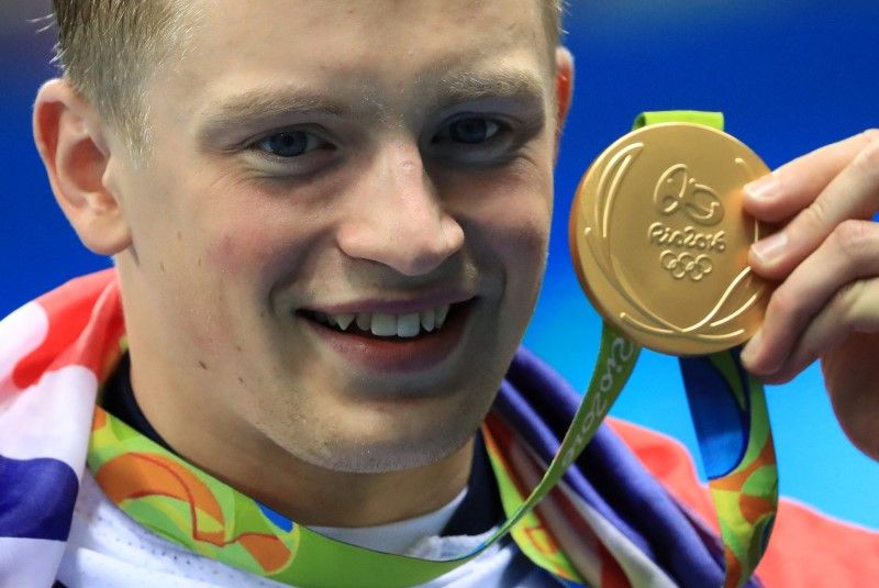 Adam Peaty with gold medal