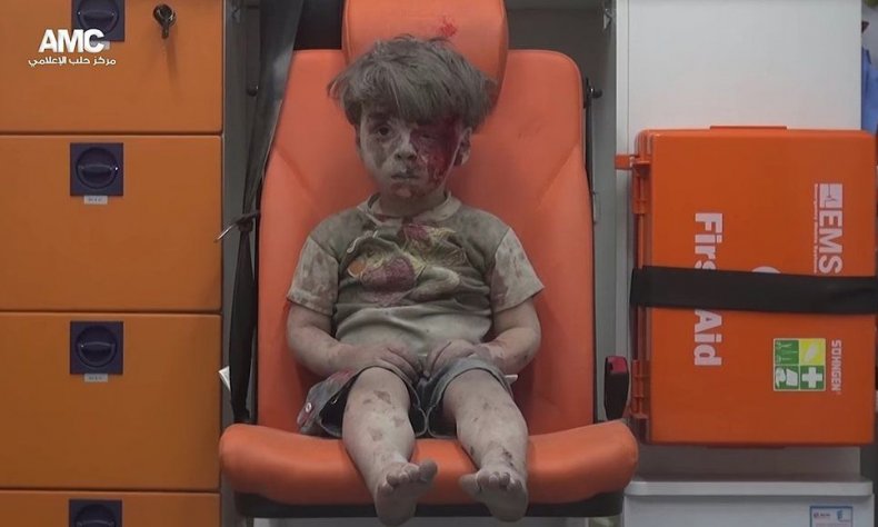 Syria Boy After Aleppo Air Strike