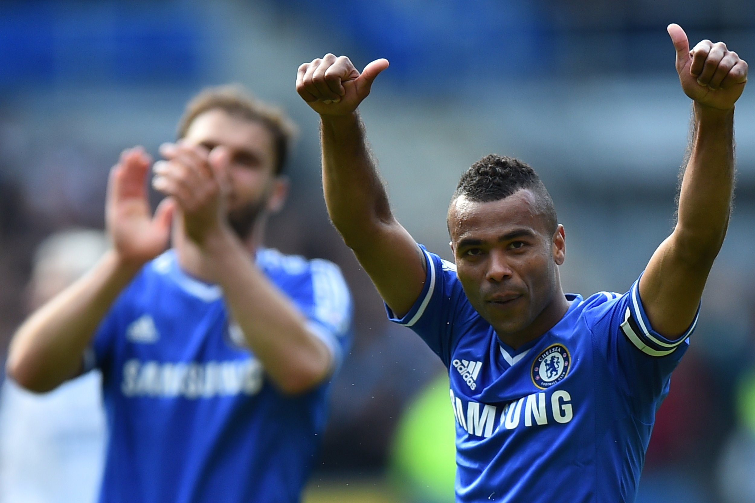 Former Chelsea defender Ashley Cole, right.