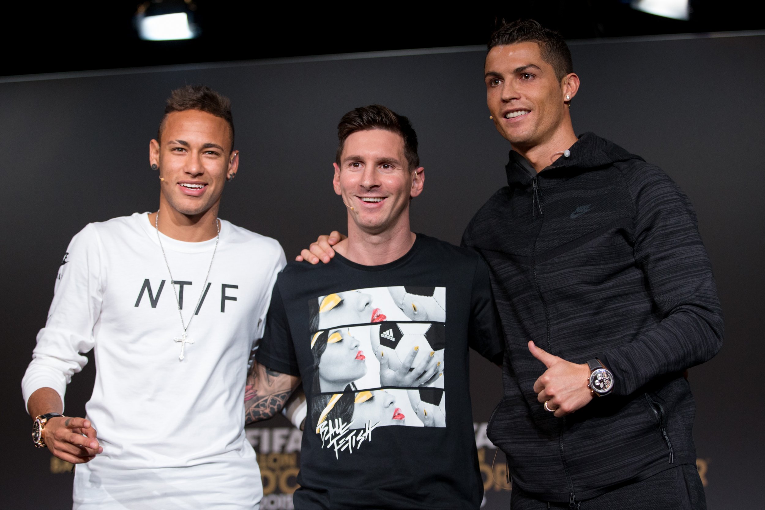 Neymar, left, Lionel Messi, center, and Cristiano Ronaldo at a press confer...