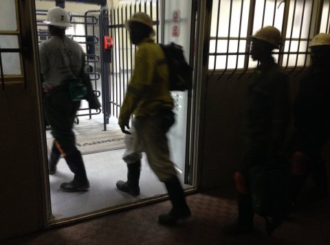 Miners entering Kusasalethu gold mine