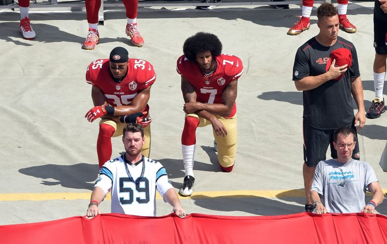 San Francisco 49ers quarterback Colin Kaepernick, center.