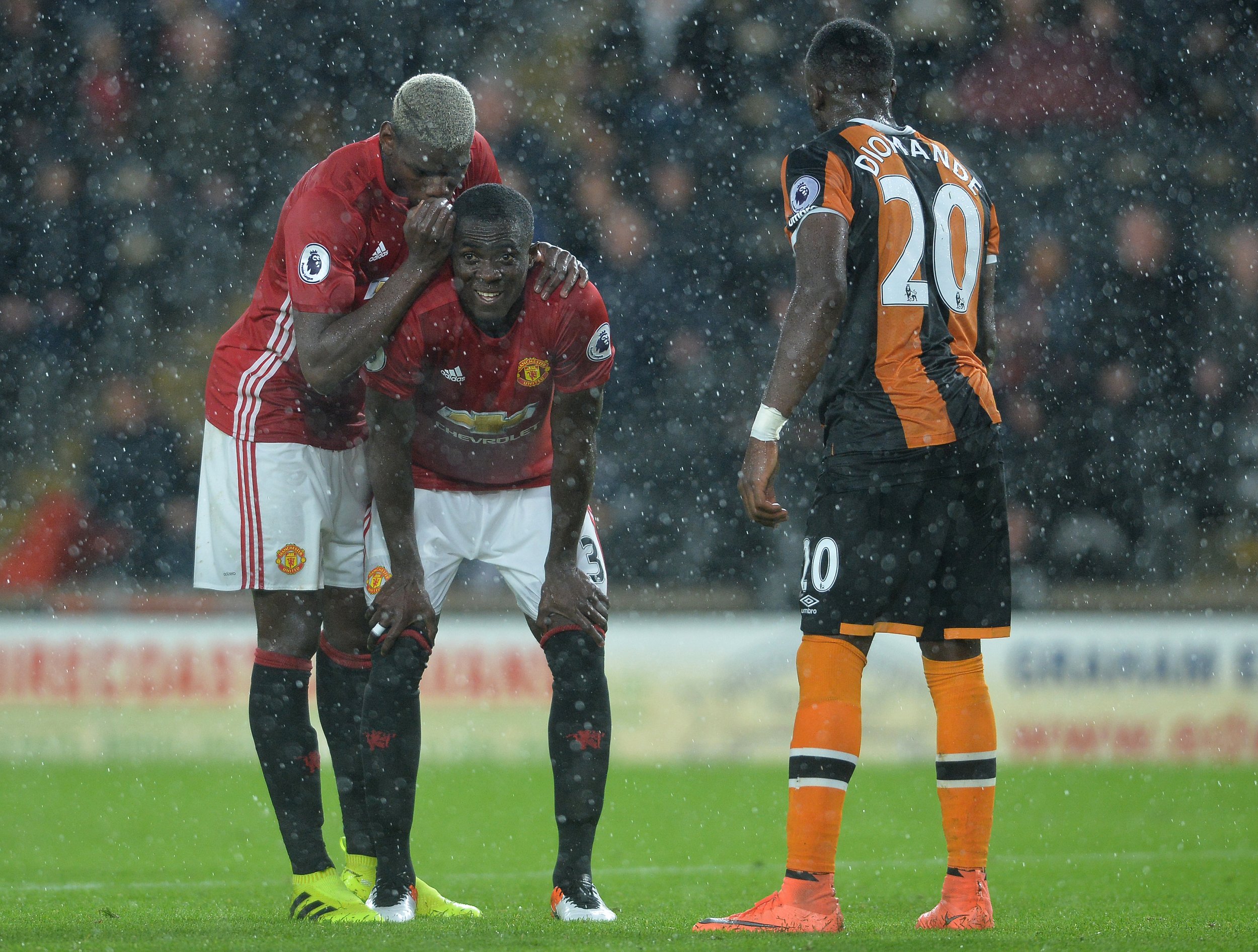 Paul Pogba, left, and Eric Bailly, second from left, of Manchester United at KC Stadium, Hull.