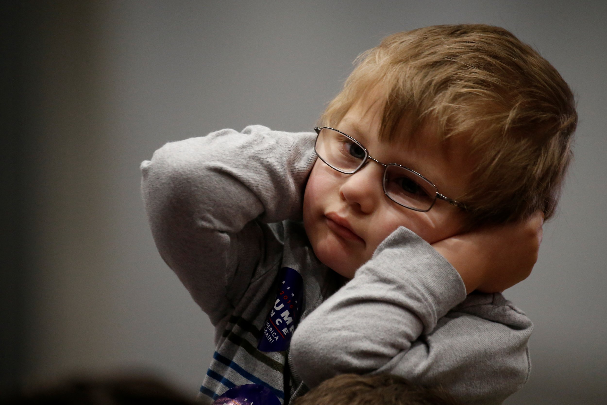 Child listening to Donald Trump