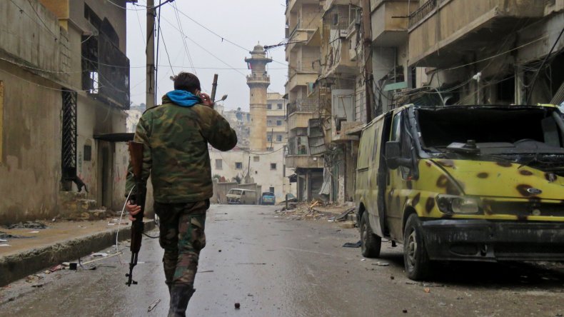 Syrian soldier walking in Aleppo
